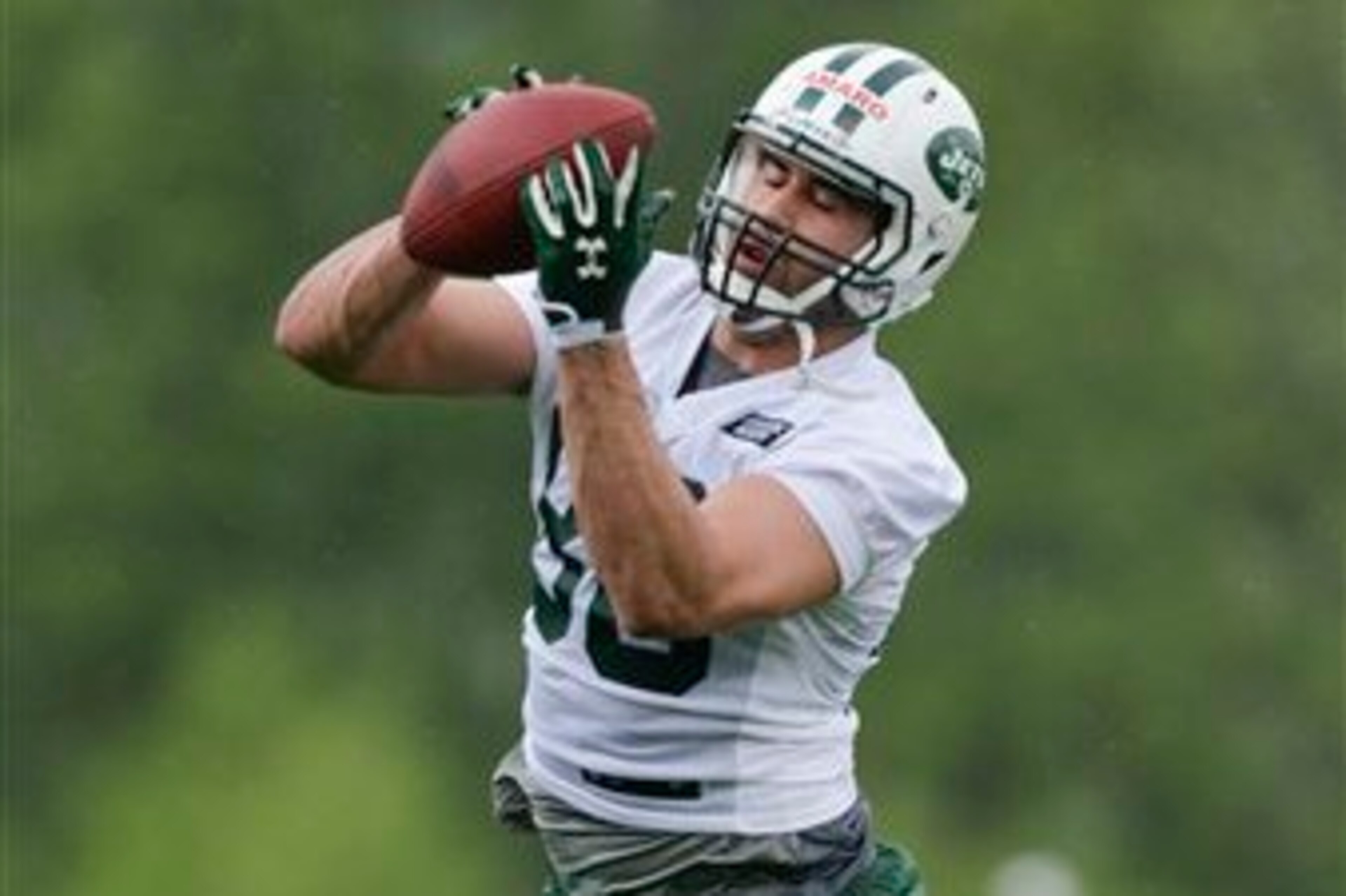 Round 2 selection Jace Amaro snags a ball at the New York Jets' rookie minicamp.