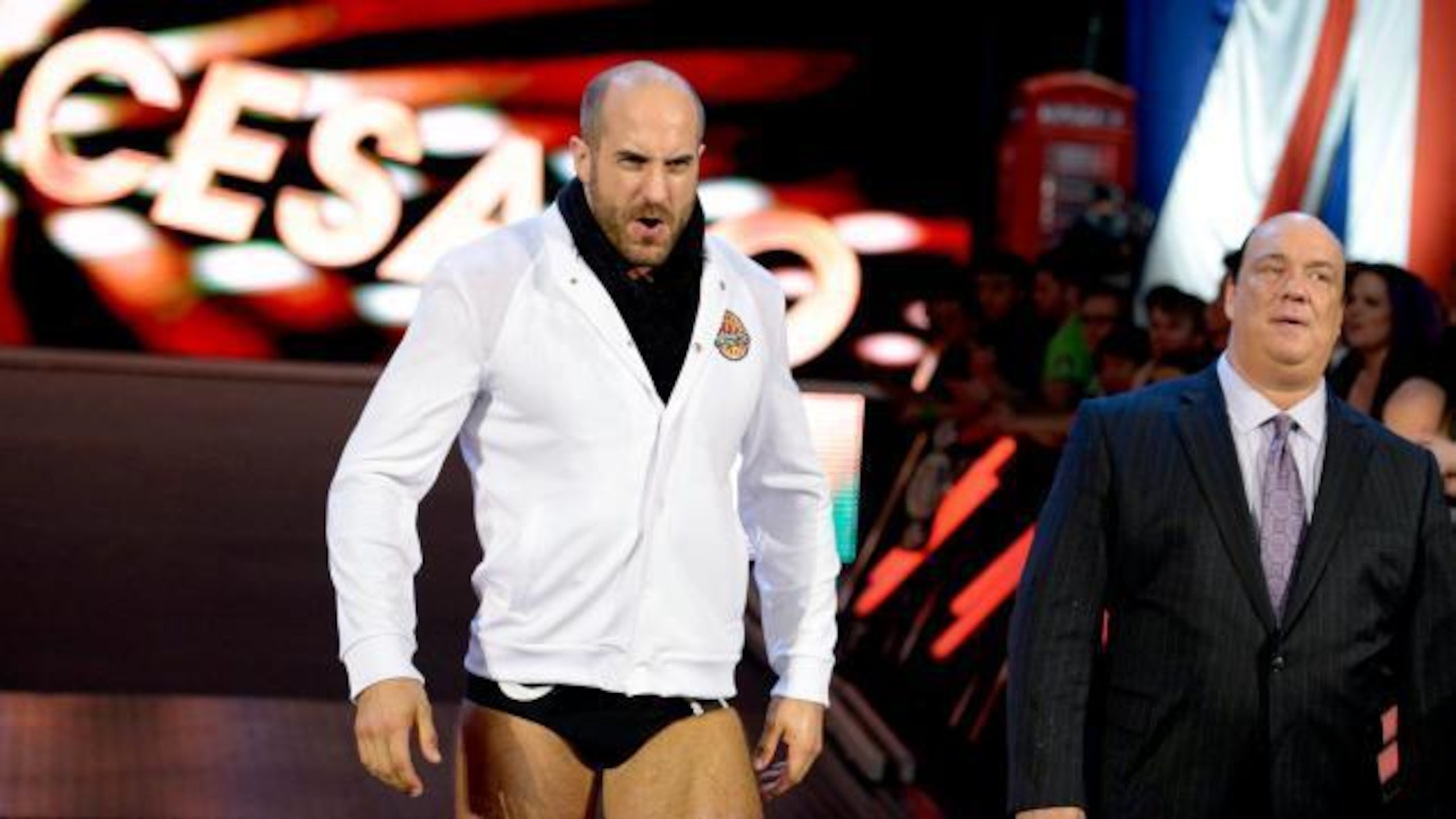 Cesaro makes his entrance for his match against Sheamus on Raw.