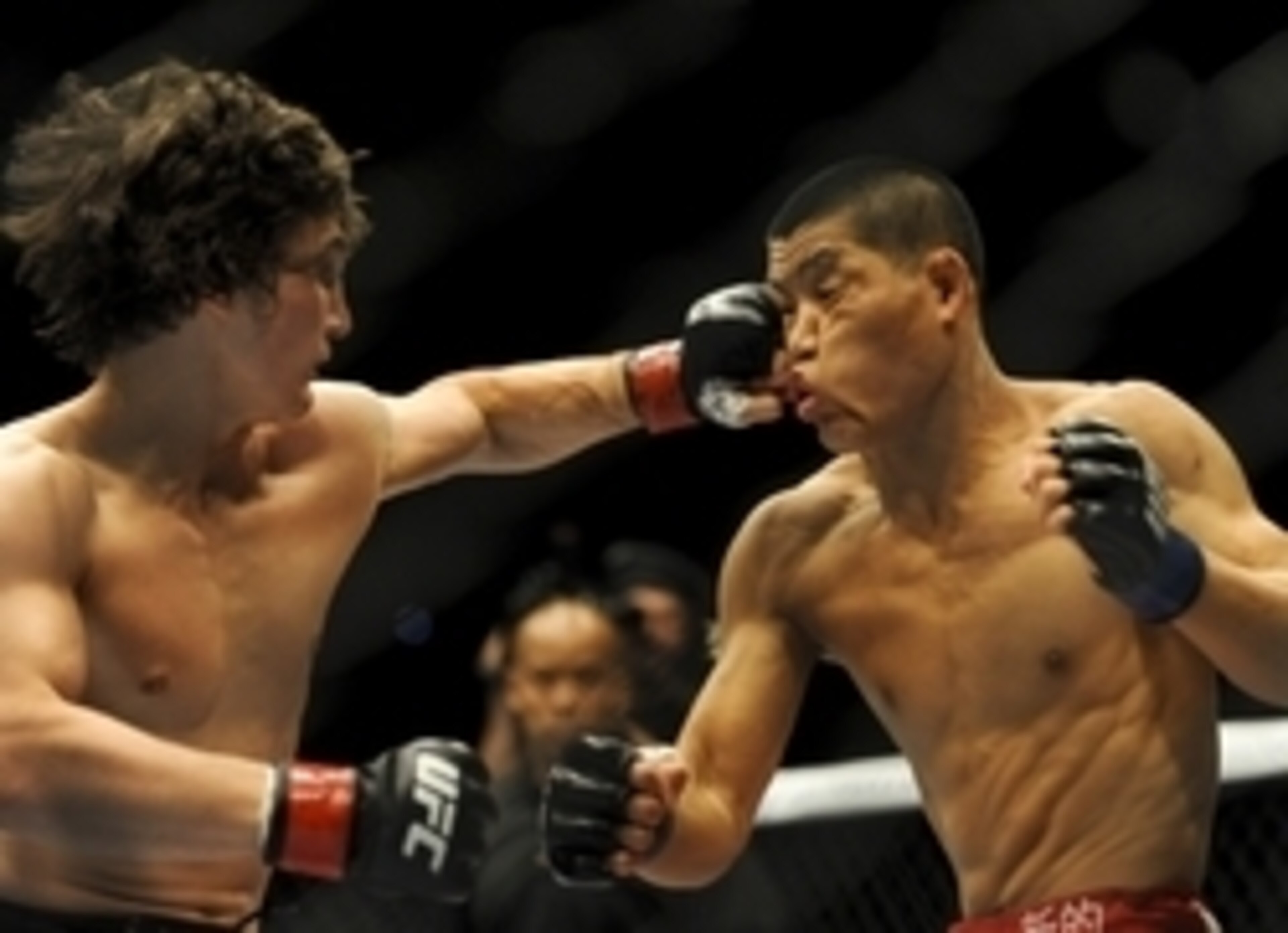 Li Jiangliang (right) defeated David Michaud Li Jiangliang (right) defeated David Michaud
