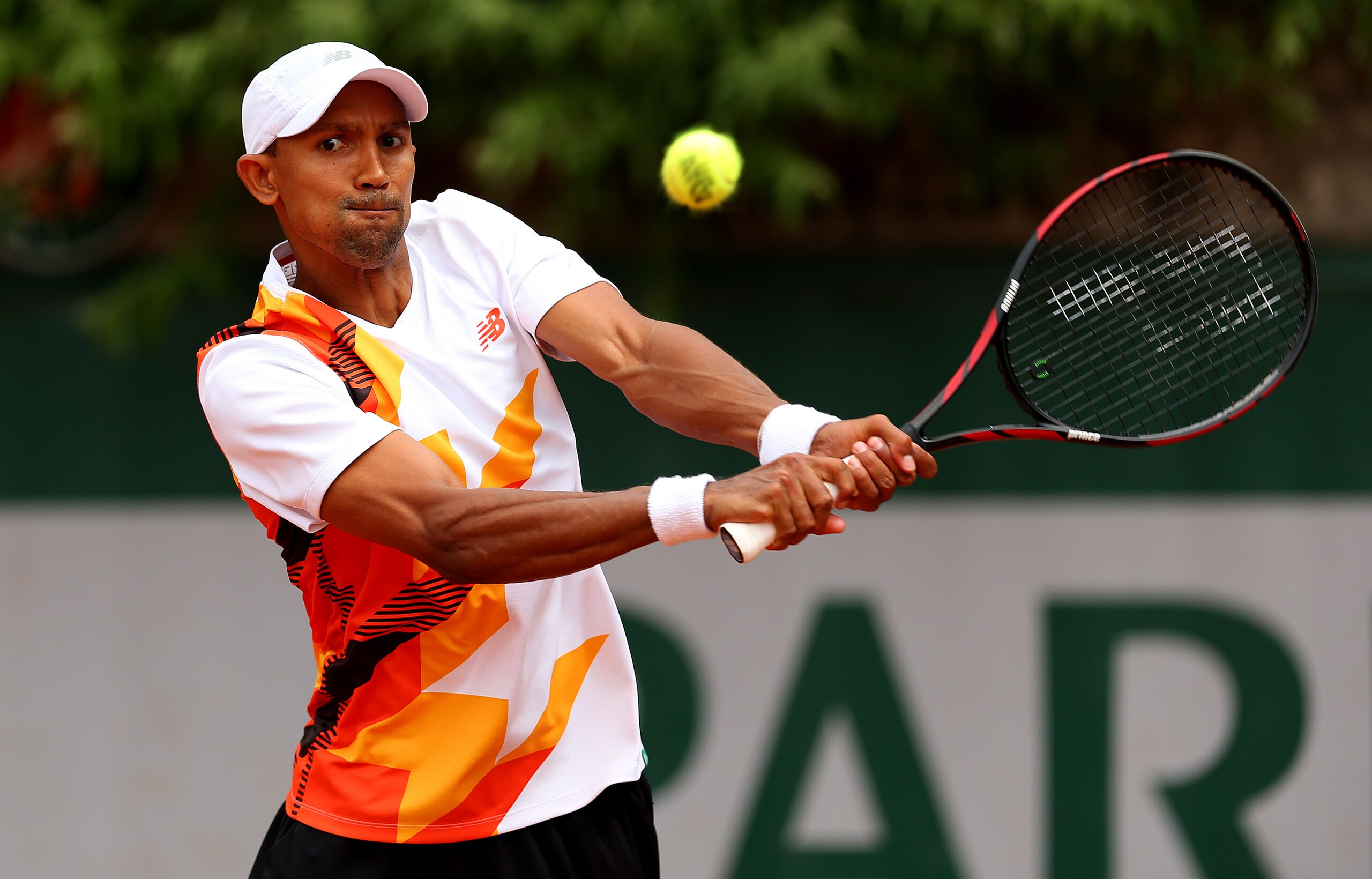 Raven Klaasen during a doubles match at the 2014 French Open