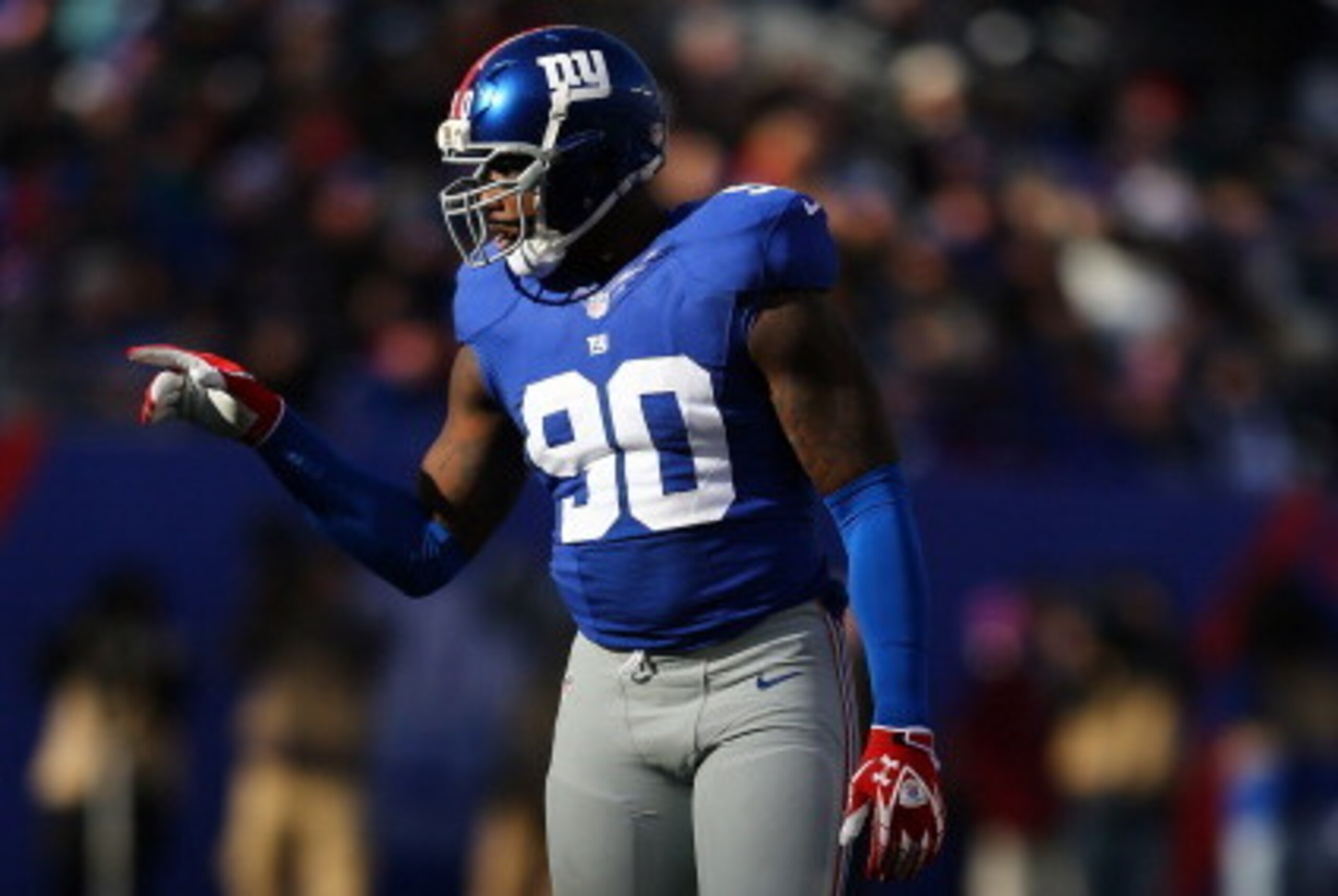 Where does DE Jason Pierre-Paul rank after a down season in 2013?