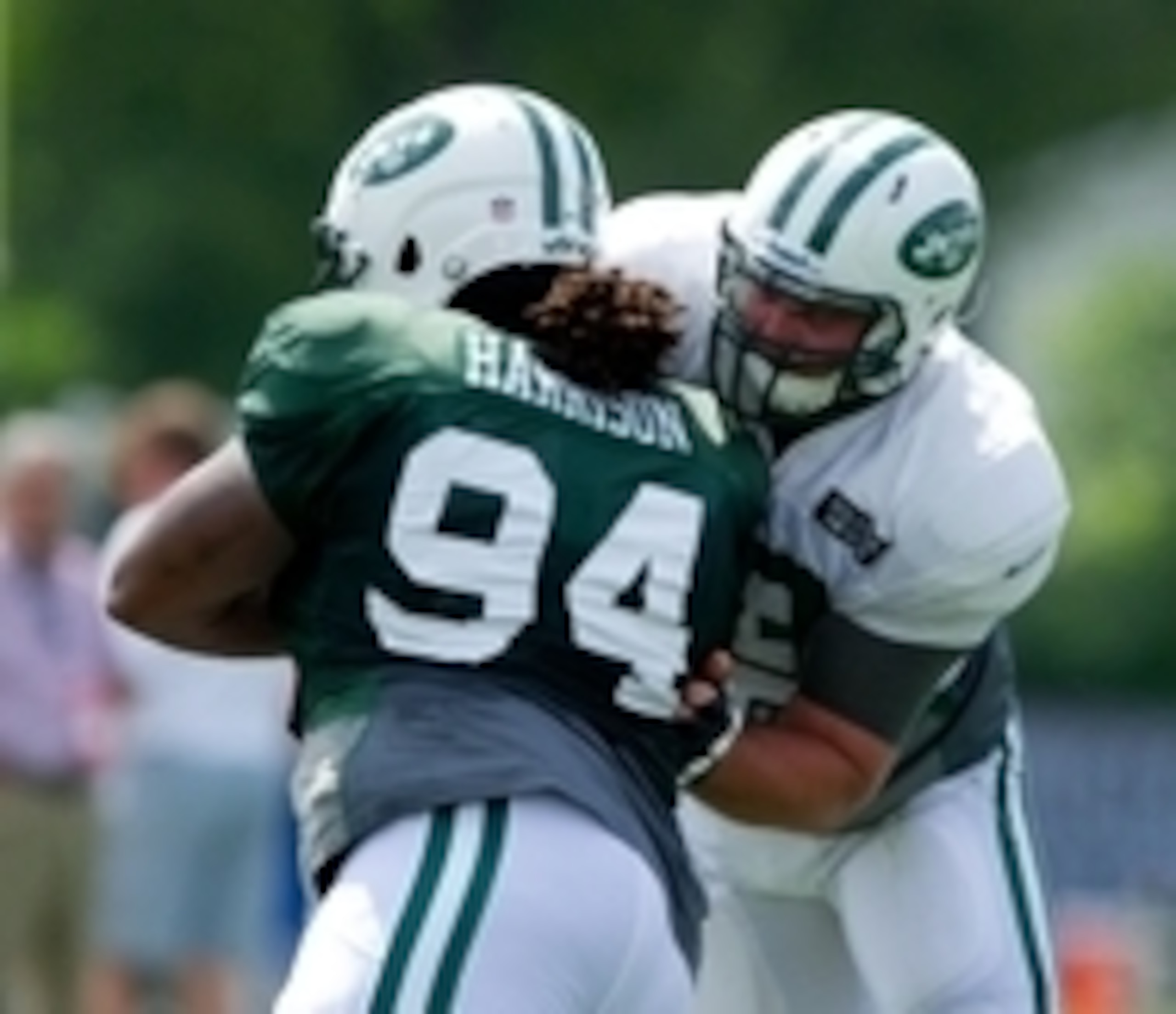 Jul 31, 2013; Cortland, NY, USA; New York Jets center Dalton Freeman (right) blocks defensive tackle Damon Harrison (94) during training camp at SUNY Cortland.  Mandatory Credit: Rich Barnes-USA TODAY Sports