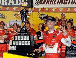 Kevin Harvick is happy to add his mug to the storied Darlington trophy.