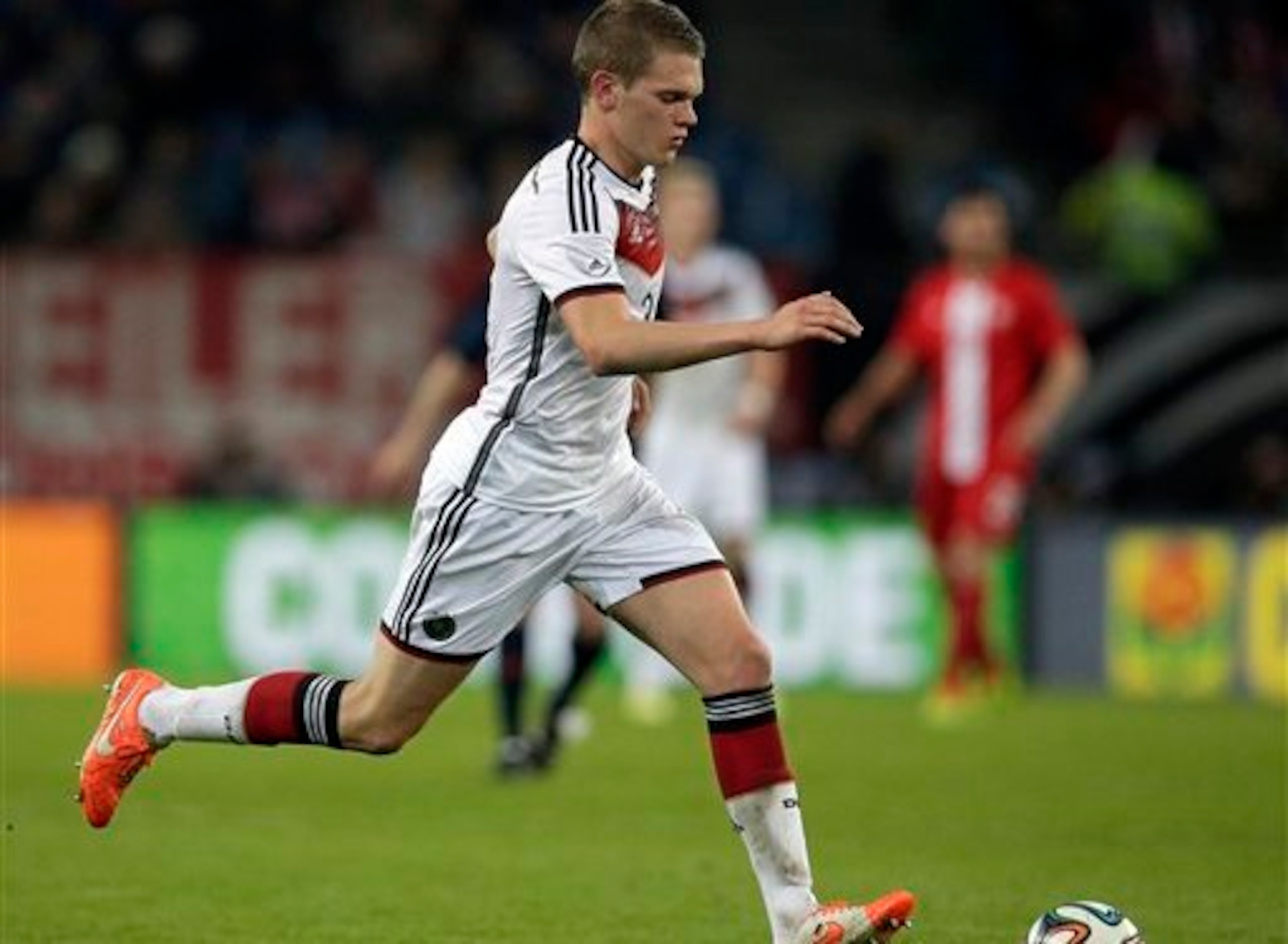 Germany's Matthias Ginter plays the ball during a friendly soccer match between Germany and Poland in Hamburg, Germany, Tuesday, May 13, 2014. The match ended in a 0-0 draw. (AP Photo/Michael Sohn)