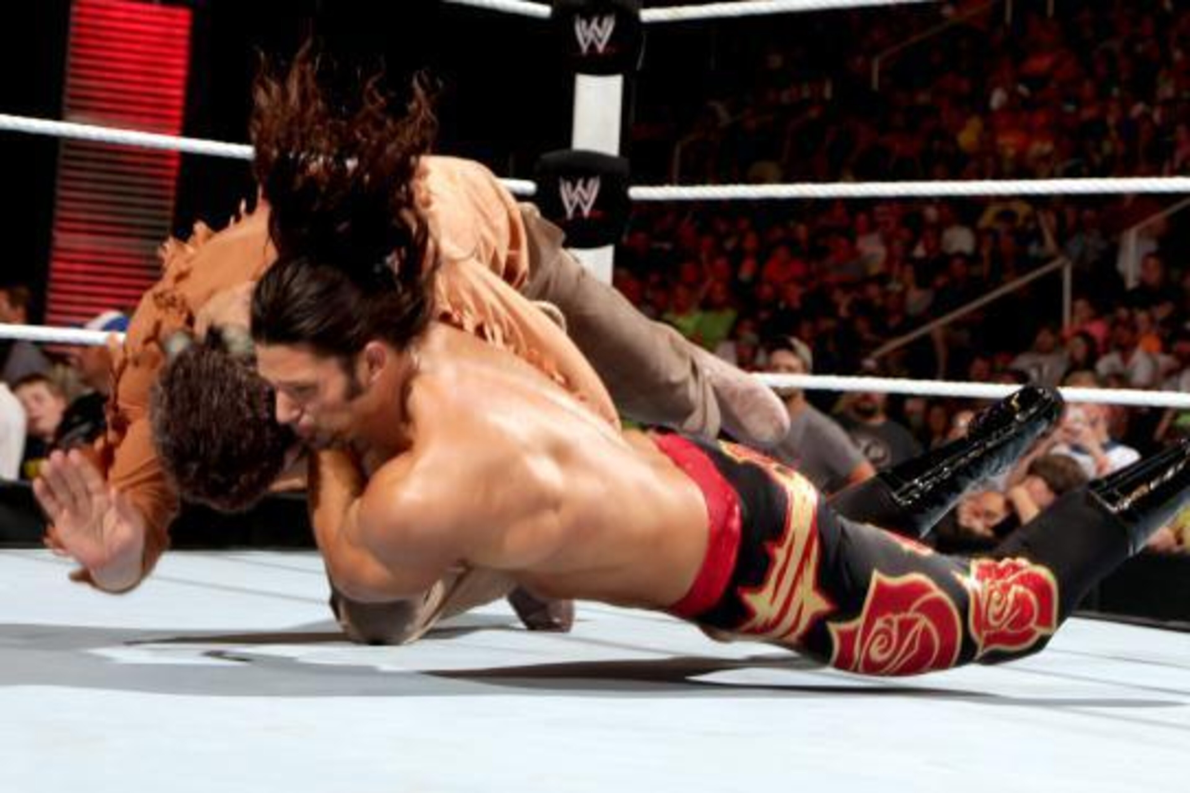 Adam Rose nails the Party Foul on Damien Sandow for the victory.