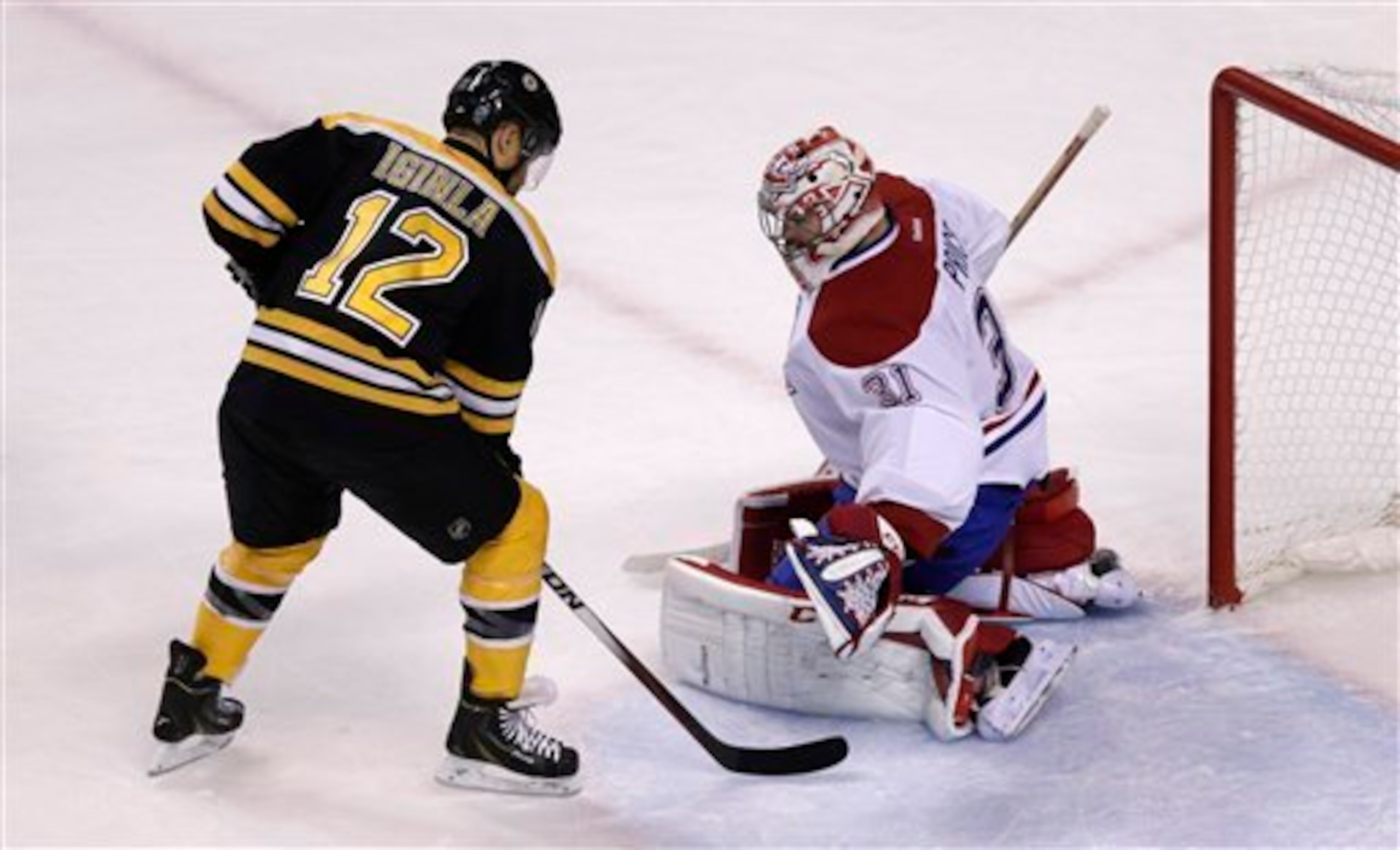 Boston Bruins forward Jarome Iginla in front of Montreal Canadiens goalie Carey Price. Boston Bruins forward Jarome Iginla in front of Montreal Canadiens goalie Carey Price.