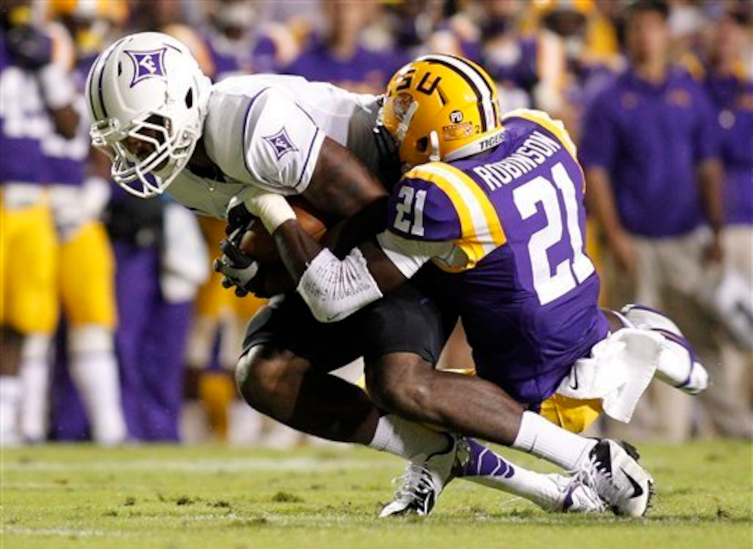 LSU cornerback Rashard Robinson (right) against Furman last season.