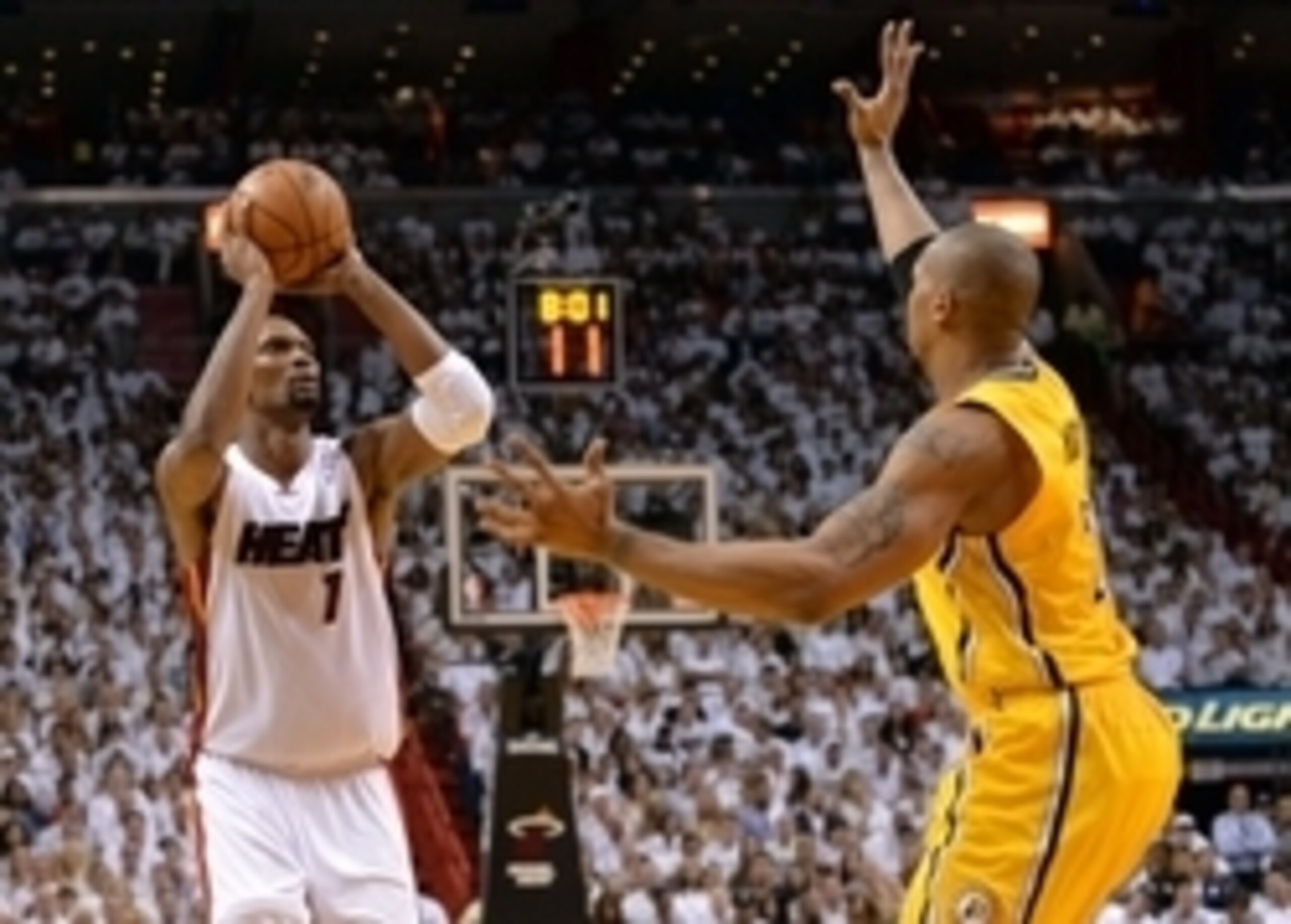 May 30, 2014; Miami, FL, USA; Miami Heat center Chris Bosh (1) shoots against Indiana Pacers forward David West (21) during the first half in game six of the Eastern Conference Finals of the 2014 NBA Playoffs at American Airlines Arena. Mandatory Credit: 