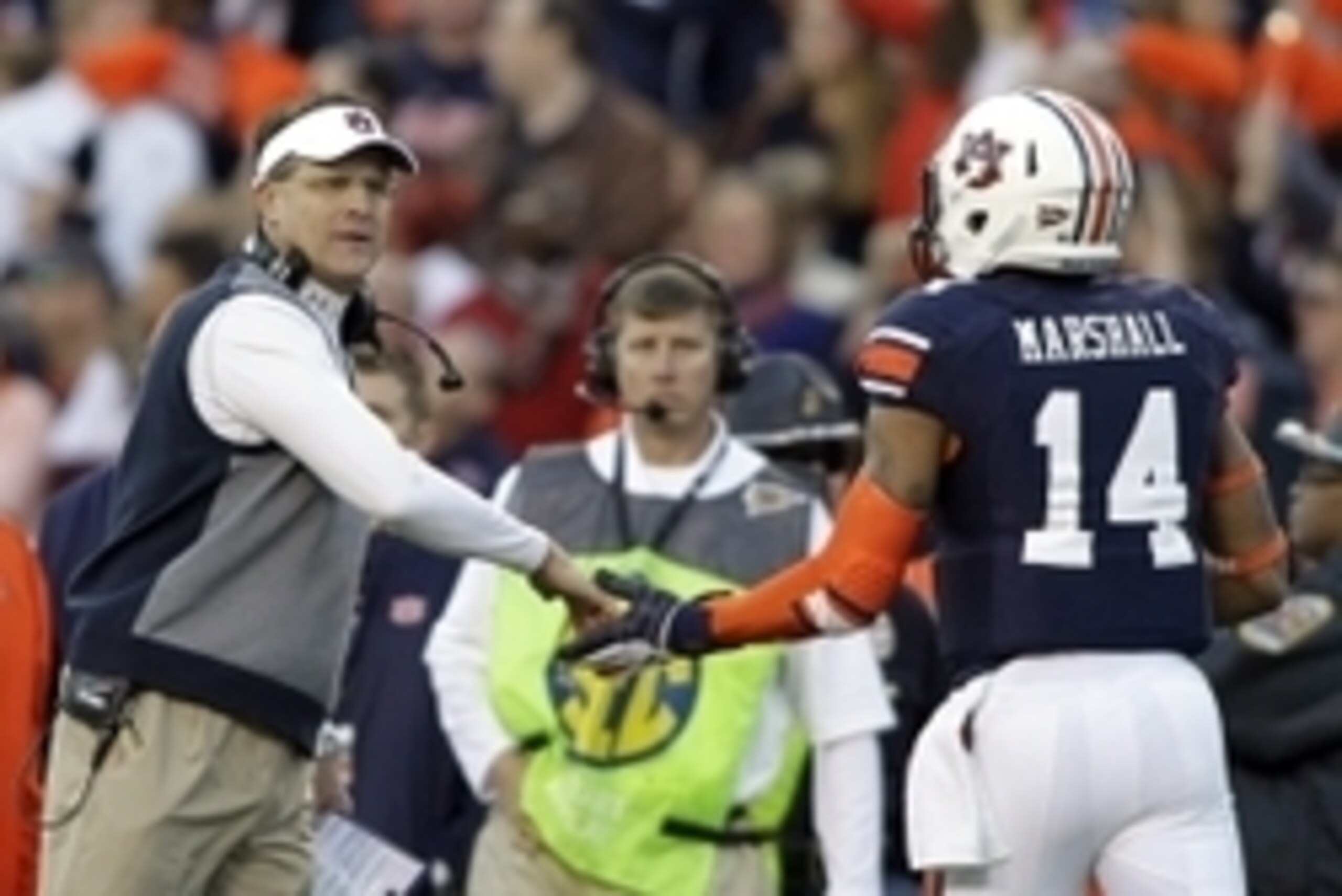 Gus Malzahn and Nick Marshall Gus Malzahn and Nick Marshall