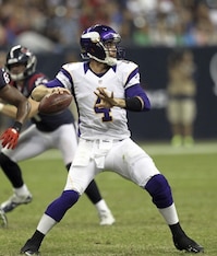 HOUSTON, TX - AUGUST 30:  McLeod Bethel-Thompson #4 of the Minnesota Vikings looks for a receiver as he stays in the pocket with pressure being applied by the Houston Texans at Reliant Stadium on August 30, 2012 in Houston, Texas. Houston won 28-24. (Phot