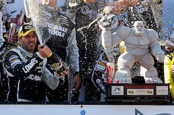 After nine career wins at Dover, Jimmie Johnson knows how to celebrate with Miles the Monster.
