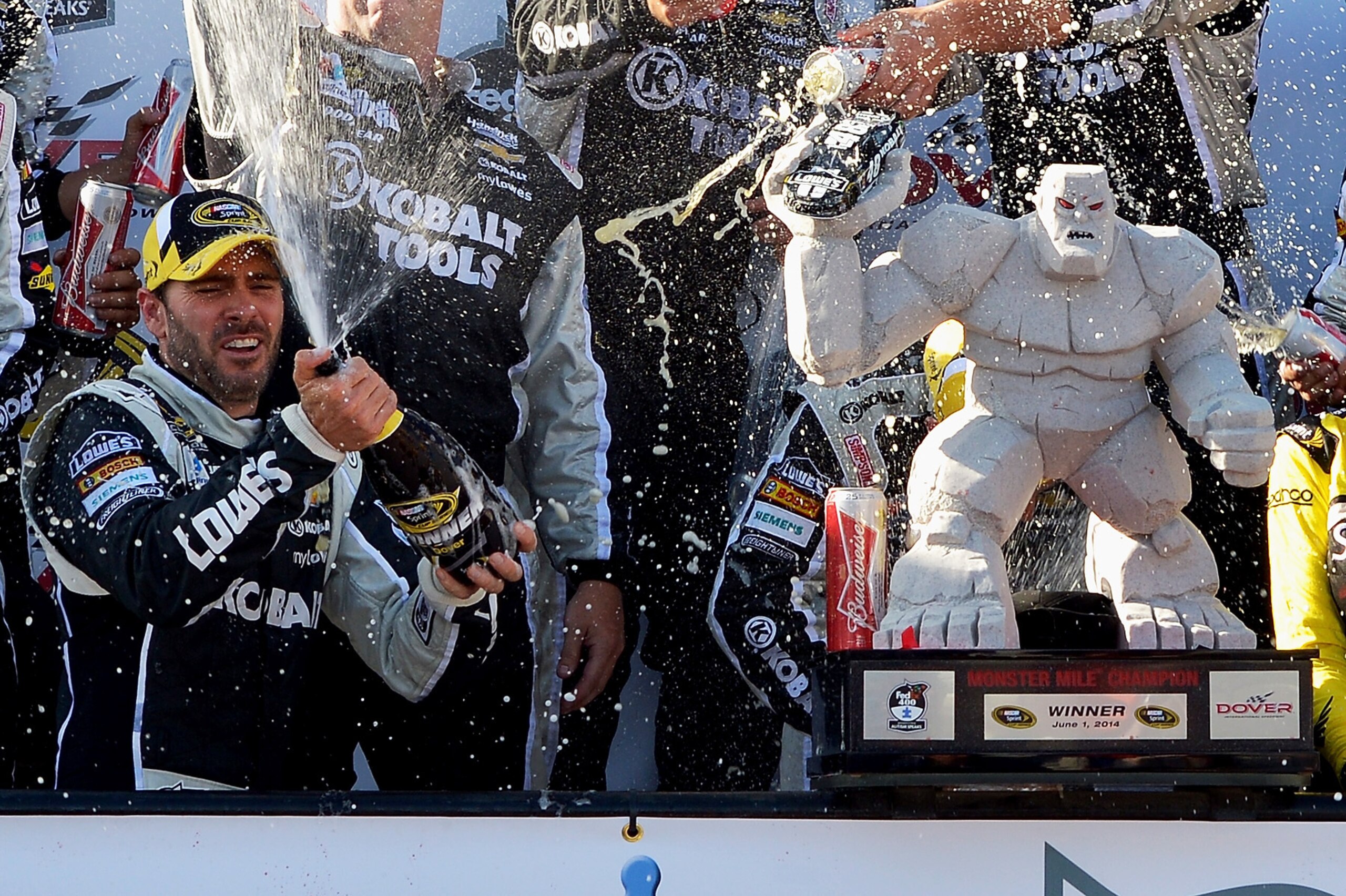 After nine career wins at Dover, Jimmie Johnson knows how to celebrate with Miles the Monster.