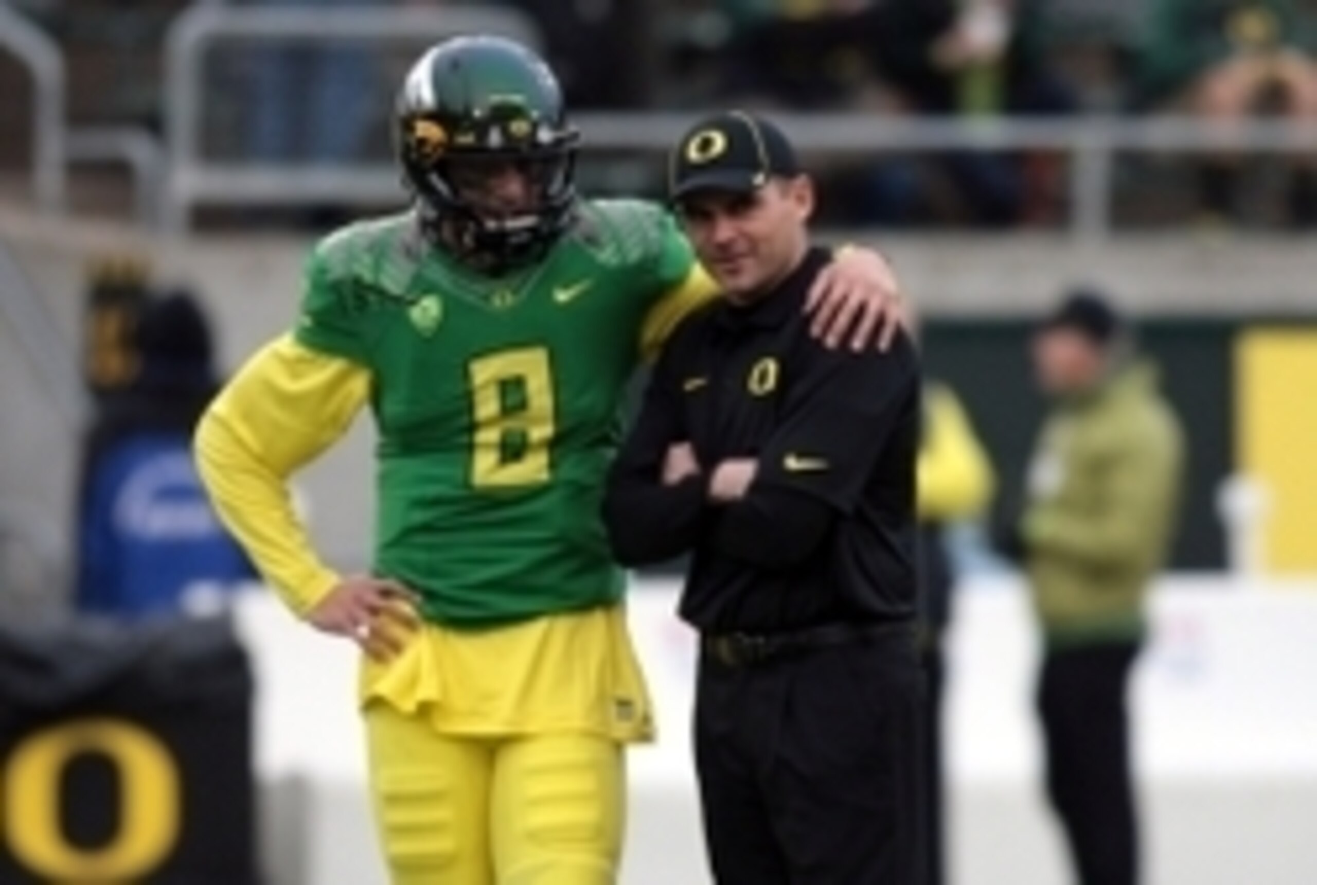QB Marcus Mariota and coach Mark Helfrich QB Marcus Mariota and coach Mark Helfrich
