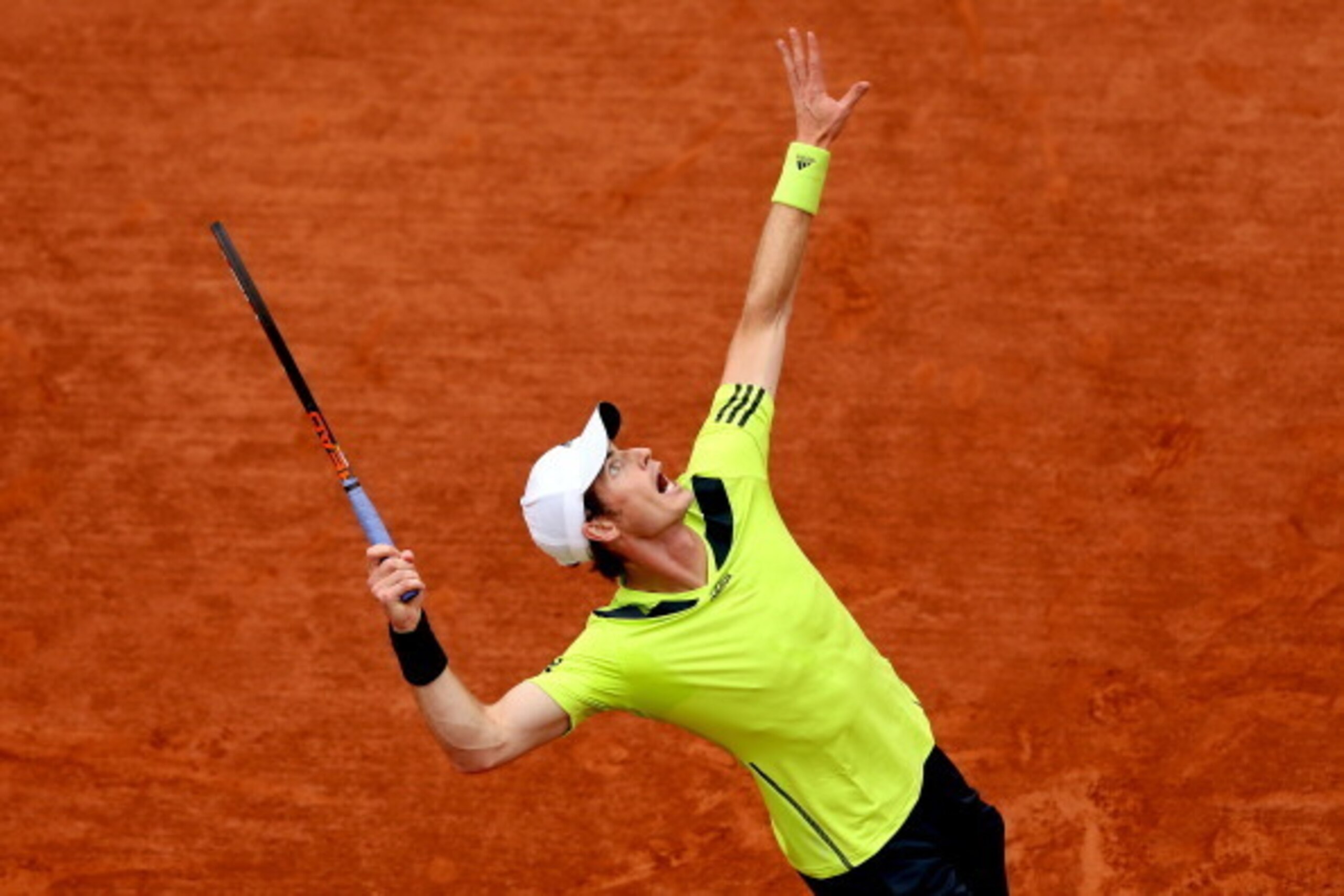 Andy Murray serves during a 2014 French Open match.