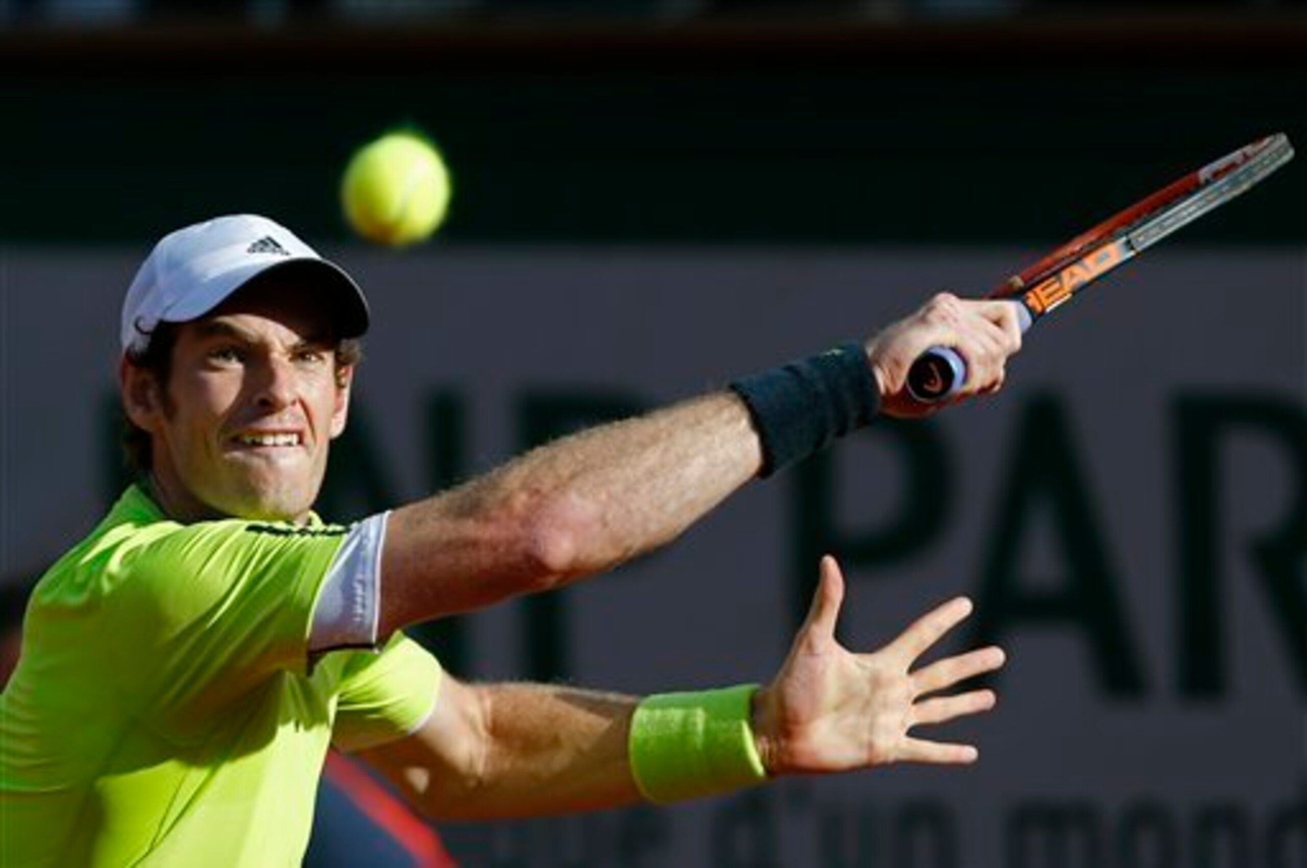 Andy Murray concentrates on the ball during his quarterfinals match against Gael Monfils at the 2014 French Open.