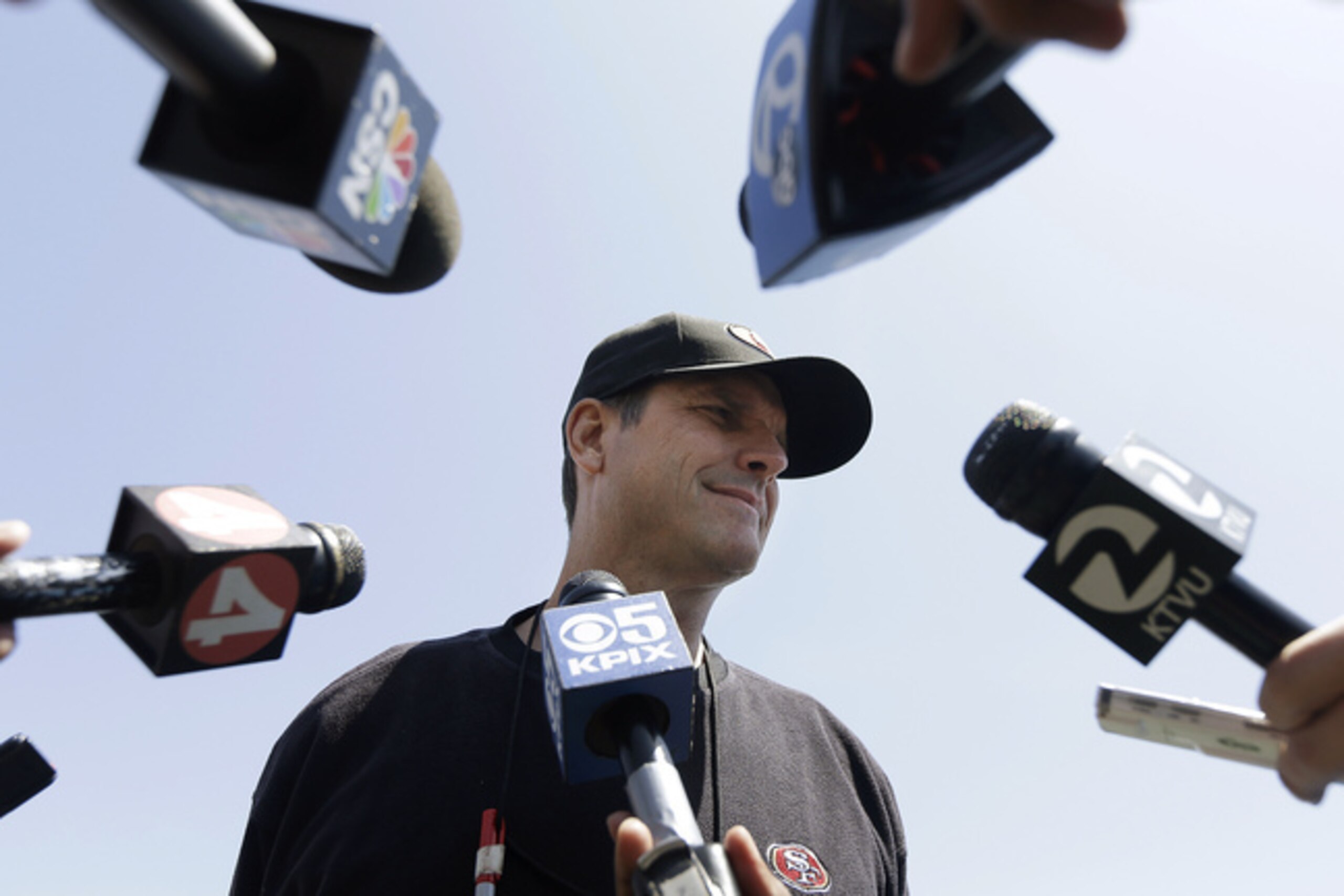San Francisco 49ers head coach Jim Harbaugh continues to evaluate his team in OTAs.