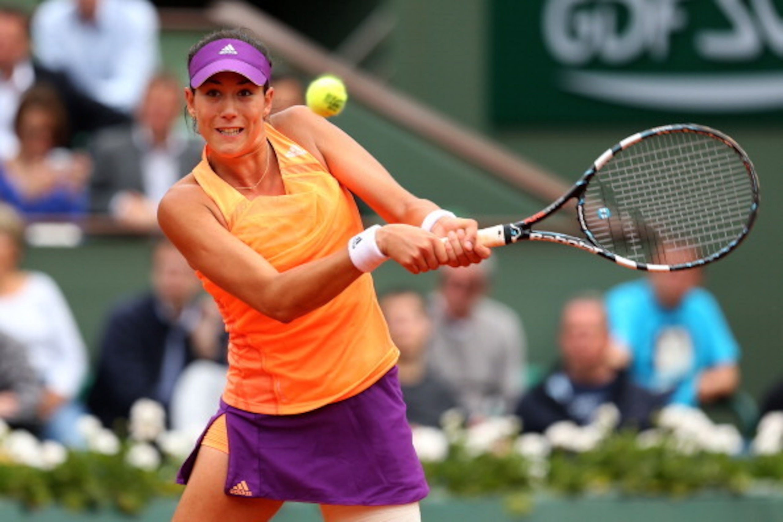 Garbine Muguruza goes for a backhand in her quarterfinals match against Maria Sharapova at the 2014 French Open. Garbine Muguruza goes for a backhand in her quarterfinals match against Maria Sharapova at the 2014 French Open.