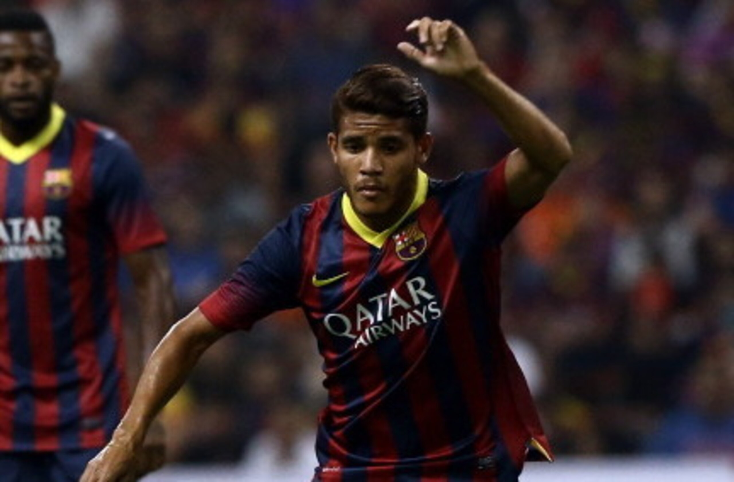 KUALA LUMPUR, MALAYSIA - AUGUST 10: Jonathan dos Santos of Barcelona FC dribbles during the friendly match between FC Barcelona and Malaysia at Shah Alam Stadium on August 10, 2013 in Kuala Lumpur, Malaysia.  (Photo by Stanley Chou/Getty Images)