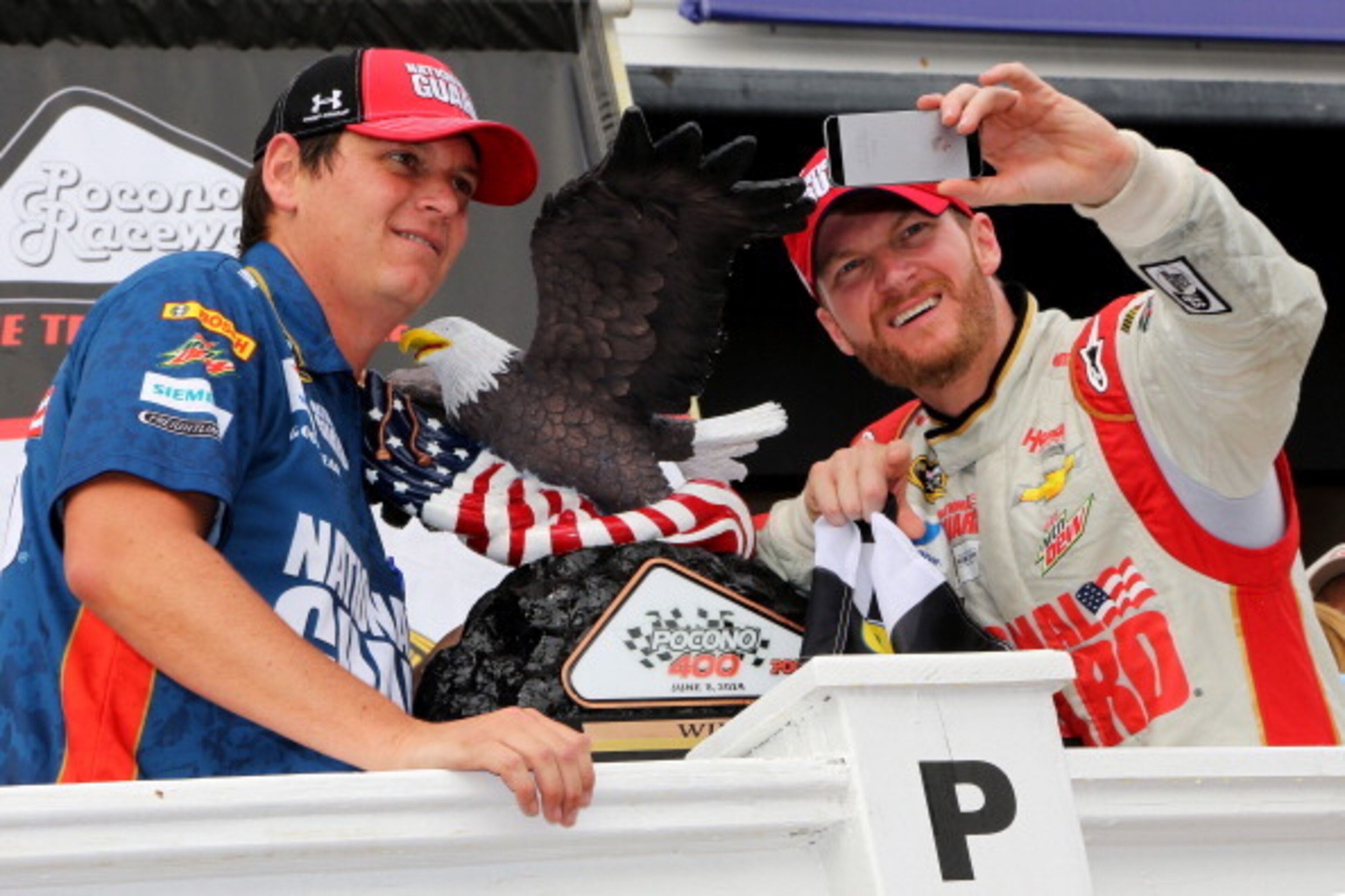 Crew chief Steve Letarte (l) and Dale Earnhardt Jr. take a victory selfie.