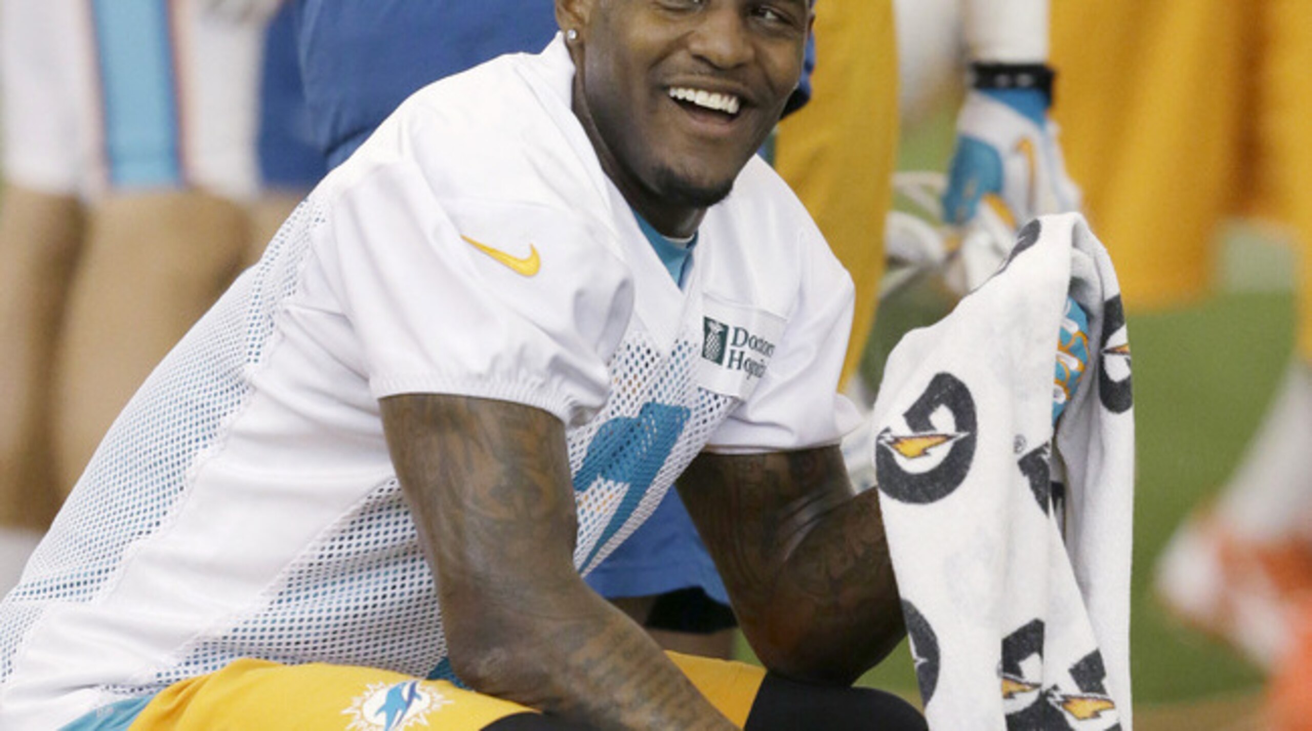 WR Mike Wallace is finding new reasons to smile.