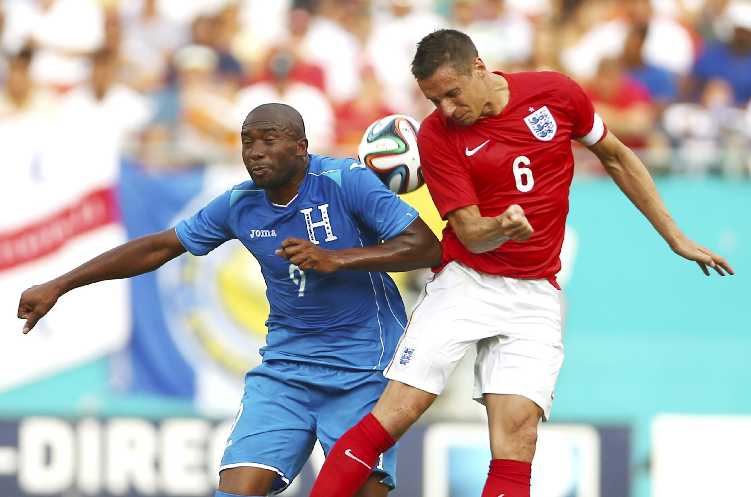 Honduras' Jerry Palacios battles with England's Phil Jagielka.