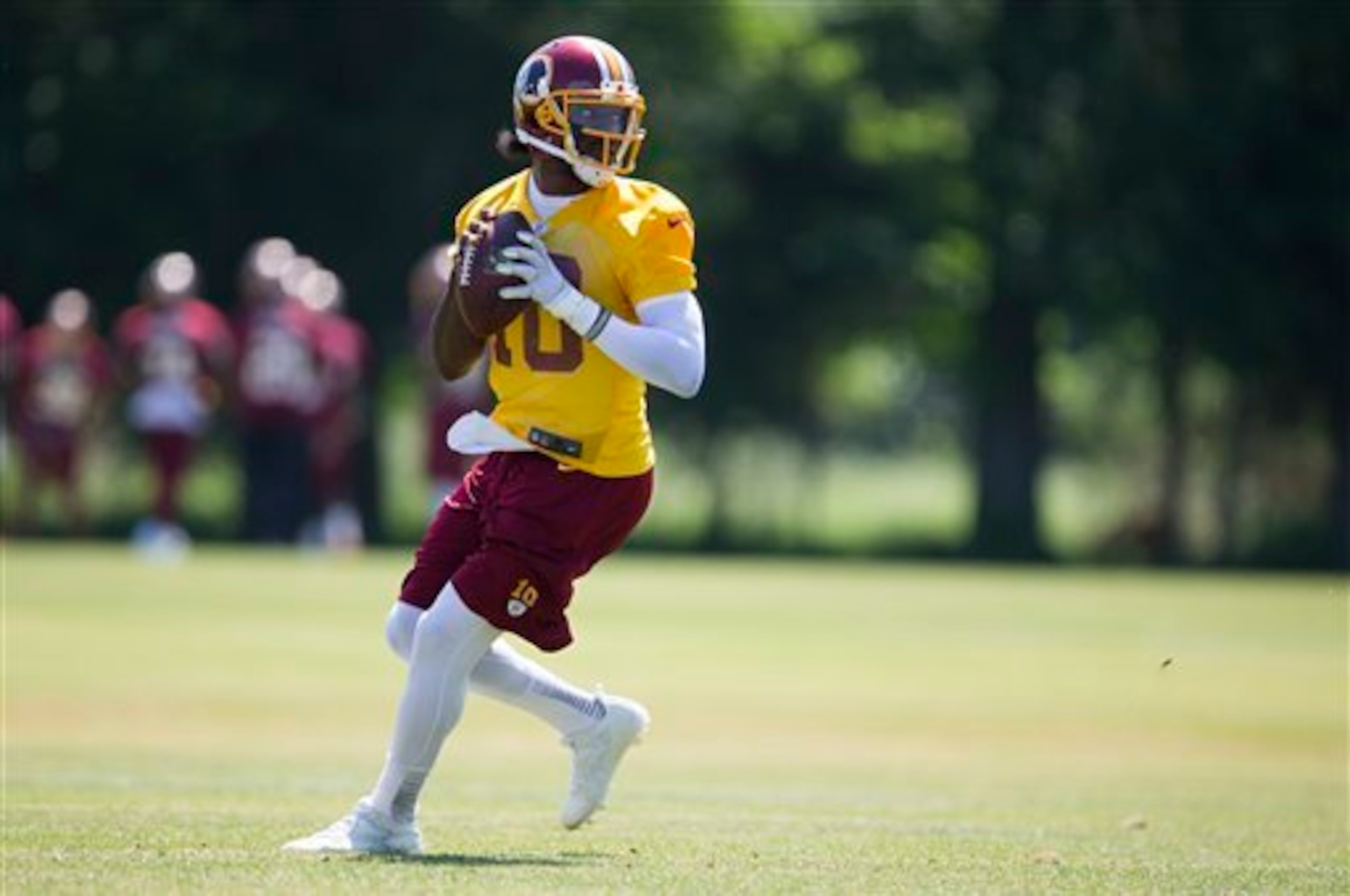 Robert Griffin III is working on improving every aspect of his passing motion.