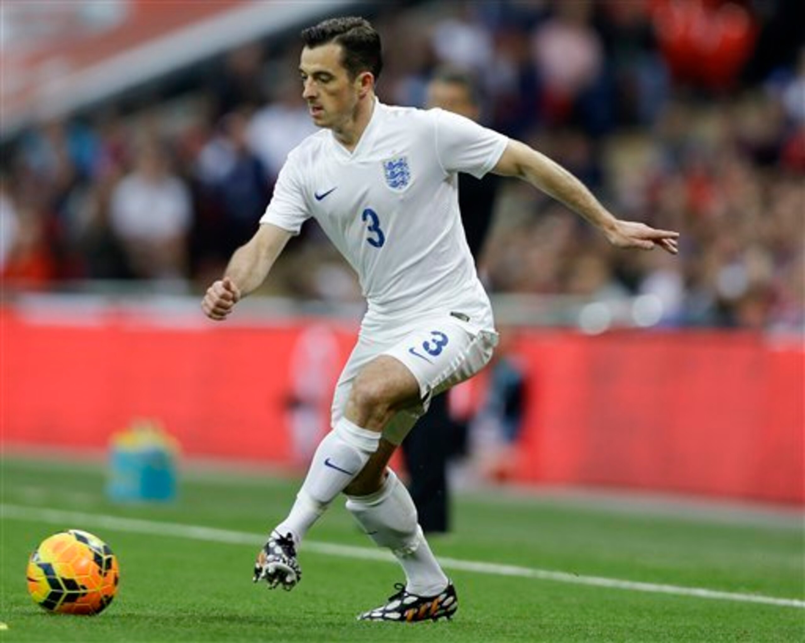 Left-back Leighton Baines in action for England.