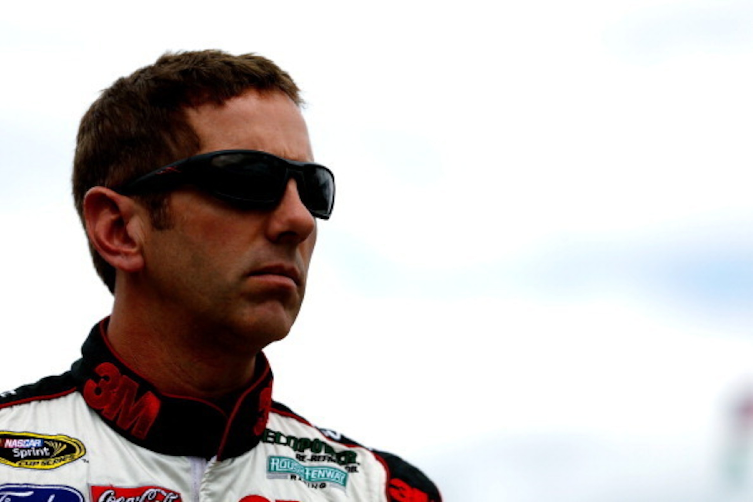 LONG POND, PA - JUNE 06: Greg Biffle, driver of the #16 3M Ford, looks on in the garage area during practice for the NASCAR Sprint Cup Series Pocono 400 at Pocono Raceway on June 6, 2014 in Long Pond, Pennsylvania. (Photo by Jeff Zelevansky/Getty Images LONG POND, PA - JUNE 06: Greg Biffle, driver of the #16 3M Ford, looks on in the garage area during practice for the NASCAR Sprint Cup Series Pocono 400 at Pocono Raceway on June 6, 2014 in Long Pond, Pennsylvania. (Photo by Jeff Zelevansky/Getty Images