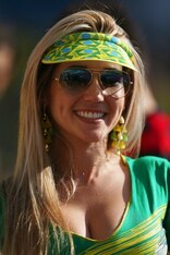 SAO PAULO, BRAZIL - JUNE 12:  A Brazil fan poses before the Opening Ceremony of the 2014 FIFA World Cup Brazil prior to the Group A match between Brazil and Croatia at Arena de Sao Paulo on June 12, 2014 in Sao Paulo, Brazil.  (Photo by Warren Little/Gett