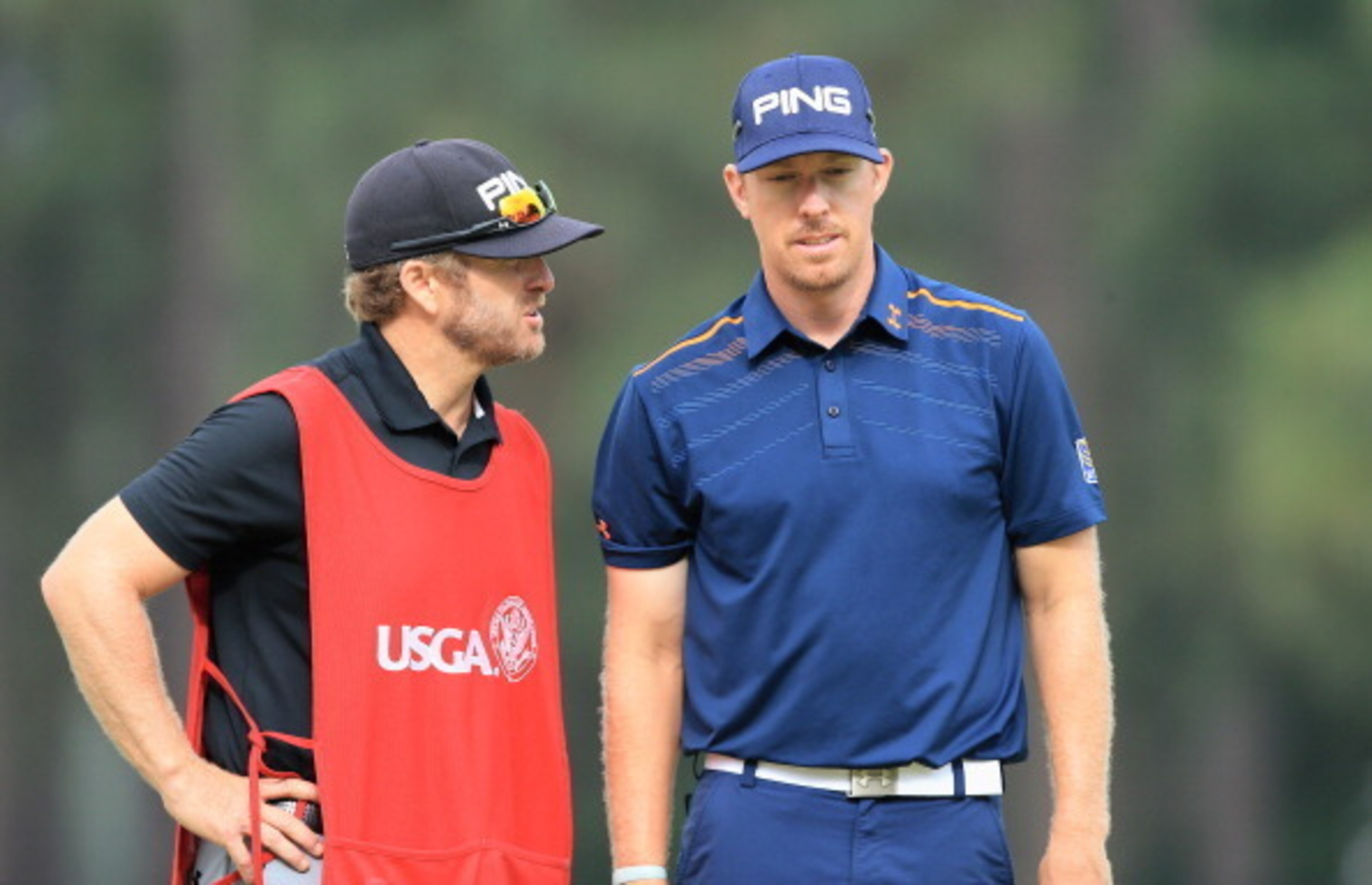 Caddie John Wood (left) consults with golfer Hunter Mahan after Friday's unthinkable gaffe. Caddie John Wood (left) consults with golfer Hunter Mahan after Friday's unthinkable gaffe.