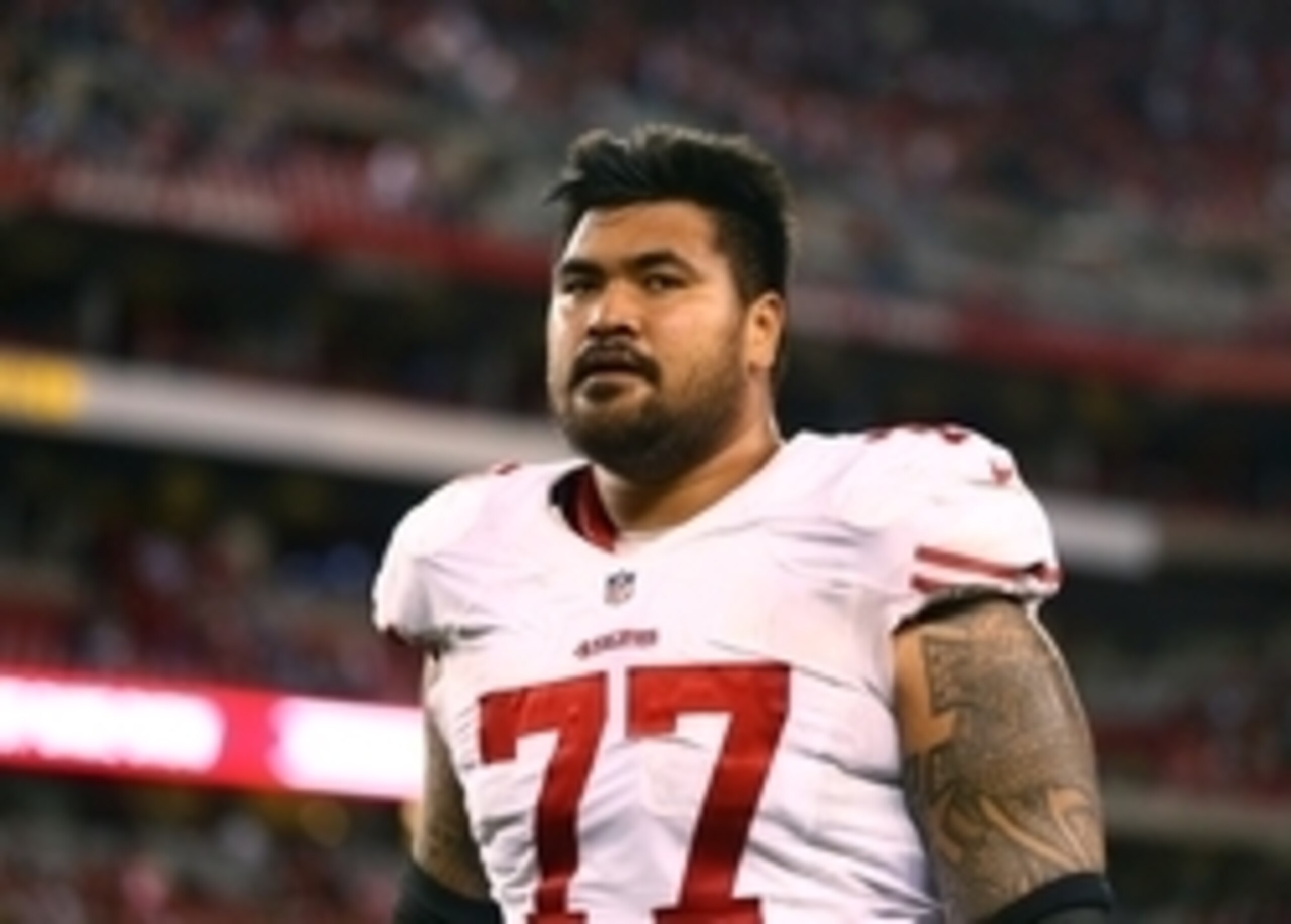 Dec 29, 2013; Phoenix, AZ, USA; San Francisco 49ers guard Mike Iupati (77) against the Arizona Cardinals at University of Phoenix Stadium. Mandatory Credit: Mark J. Rebilas-USA TODAY Sports