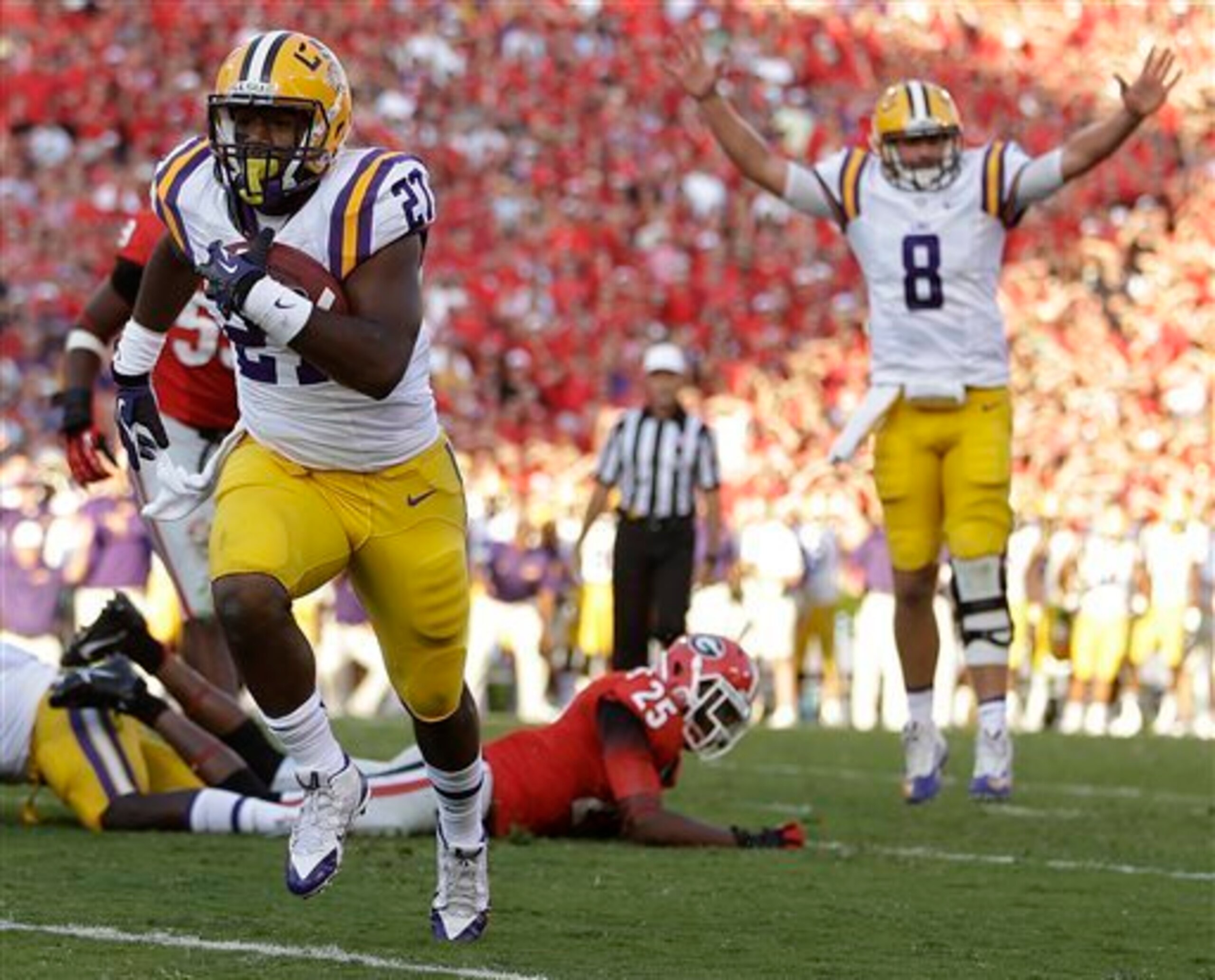 LSU running back Kenny Hilliard scores a touchdown against Georgia last season. LSU running back Kenny Hilliard scores a touchdown against Georgia last season.