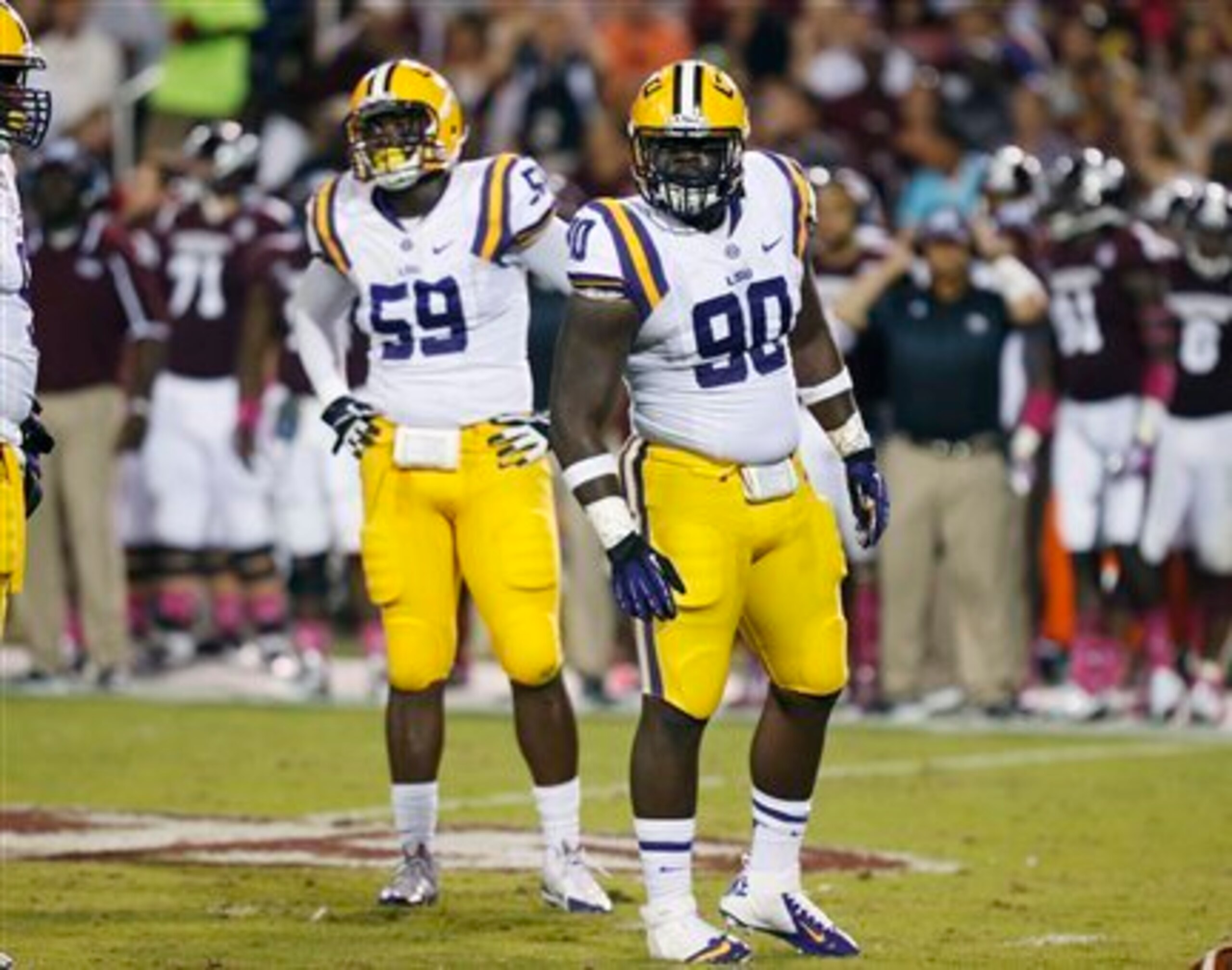 LSU defensive end Jermauria Rasco (No. 59) and Anthony Johnson (No. 90) LSU defensive end Jermauria Rasco (No. 59) and Anthony Johnson (No. 90)