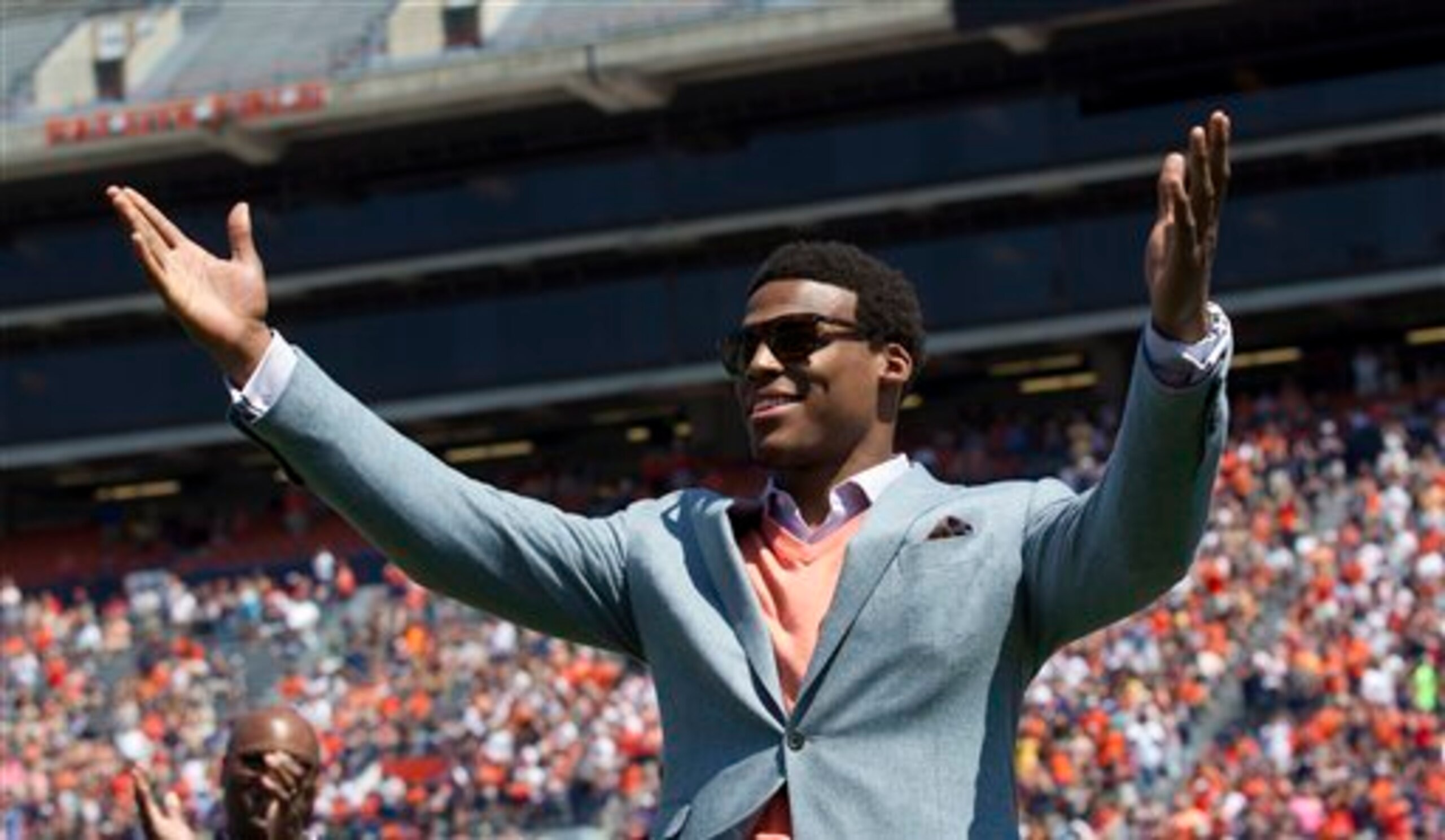 Cam Newton's recruitment by Auburn was dogged by controversy. Cam Newton's recruitment by Auburn was dogged by controversy.