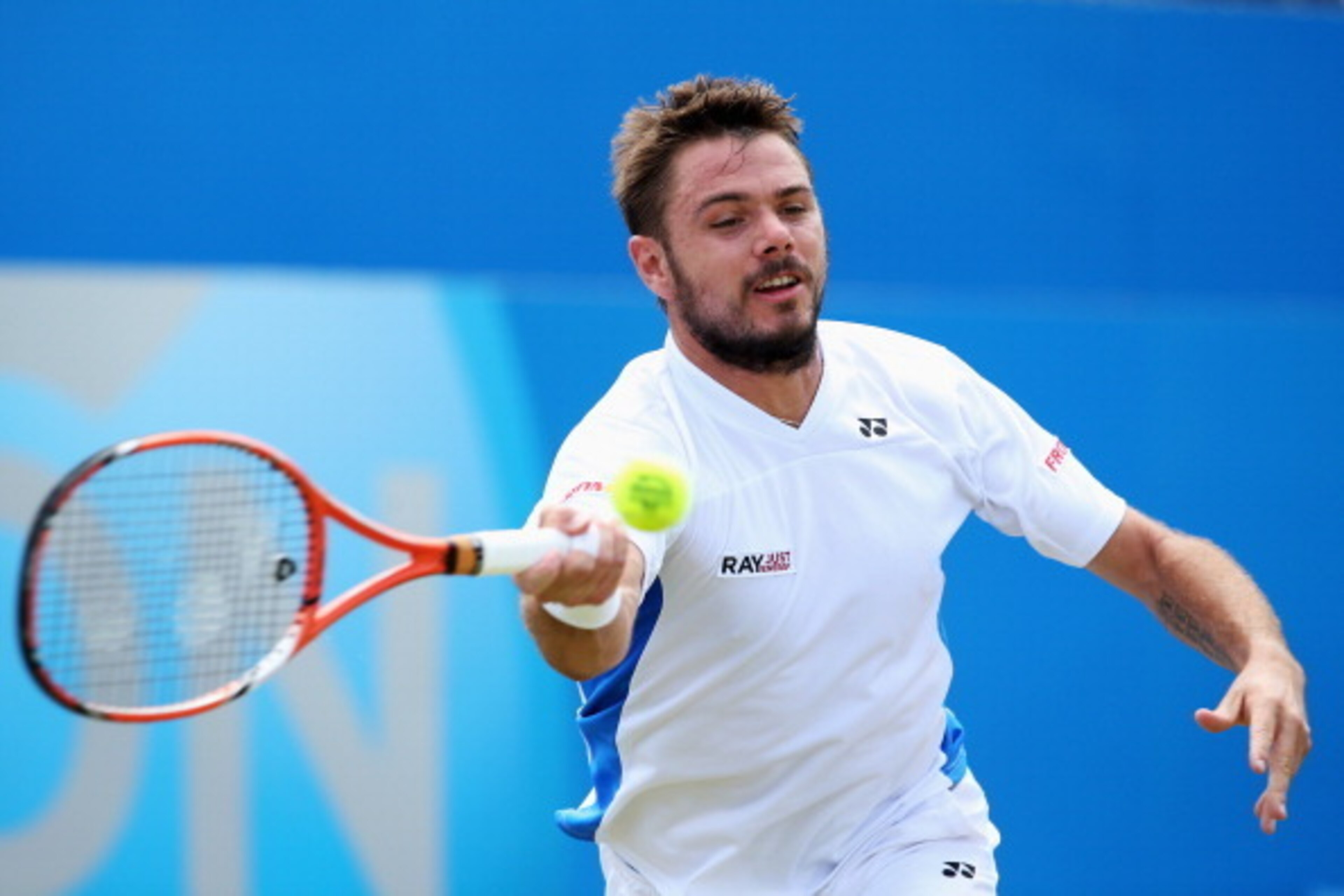 Stanislas Wawrinka during a match at Wimbledon tuneup tournament, the Queen's Cup.