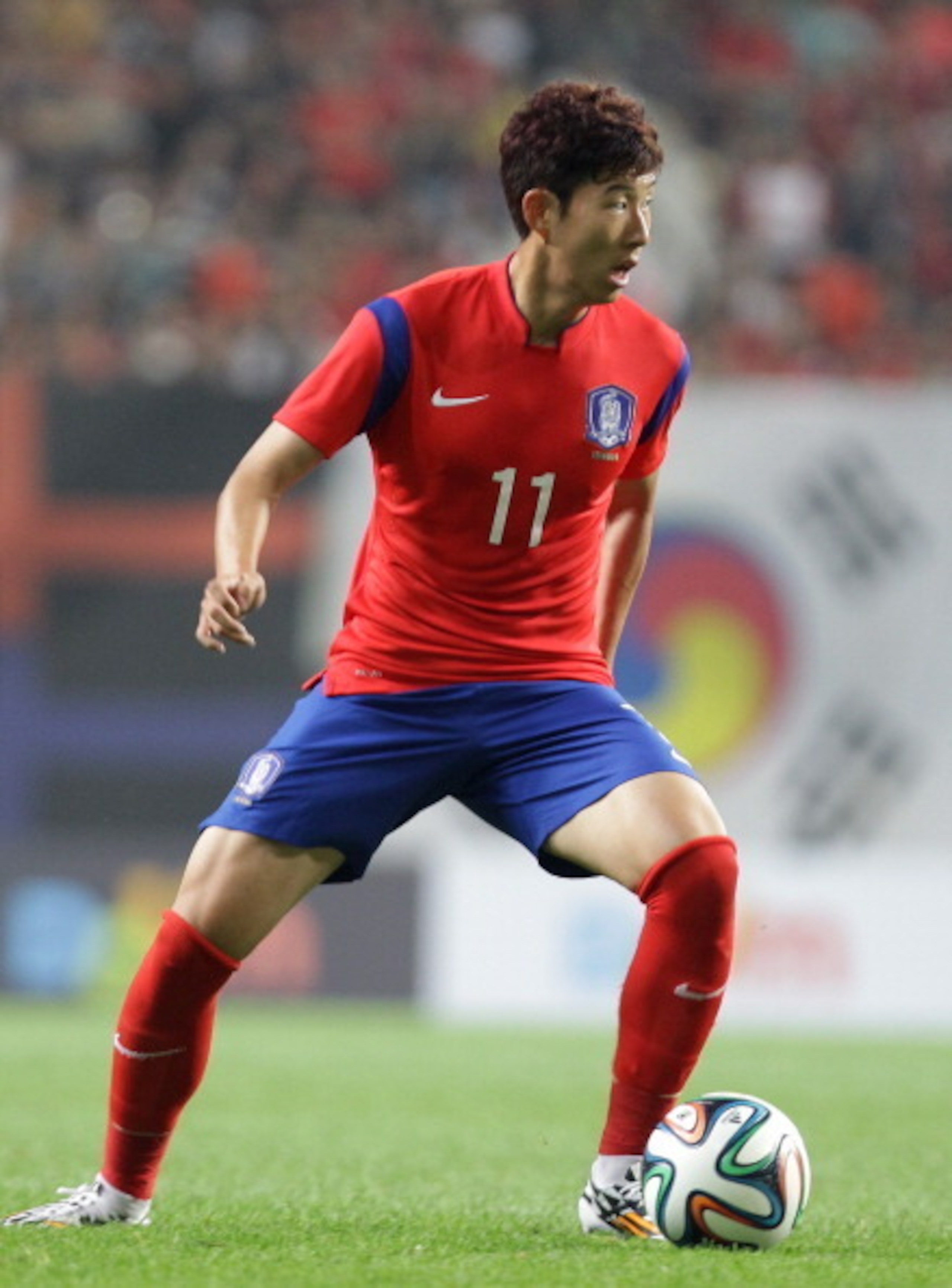 SEOUL, SOUTH KOREA - MAY 28:  Son Heung-Min of South Korea in action during international friendly match between South Korea and Tunisia at Seoul World Cup Stadium on May 28, 2014 in Seoul, South Korea.  (Photo by Chung Sung-Jun/Getty Images)
