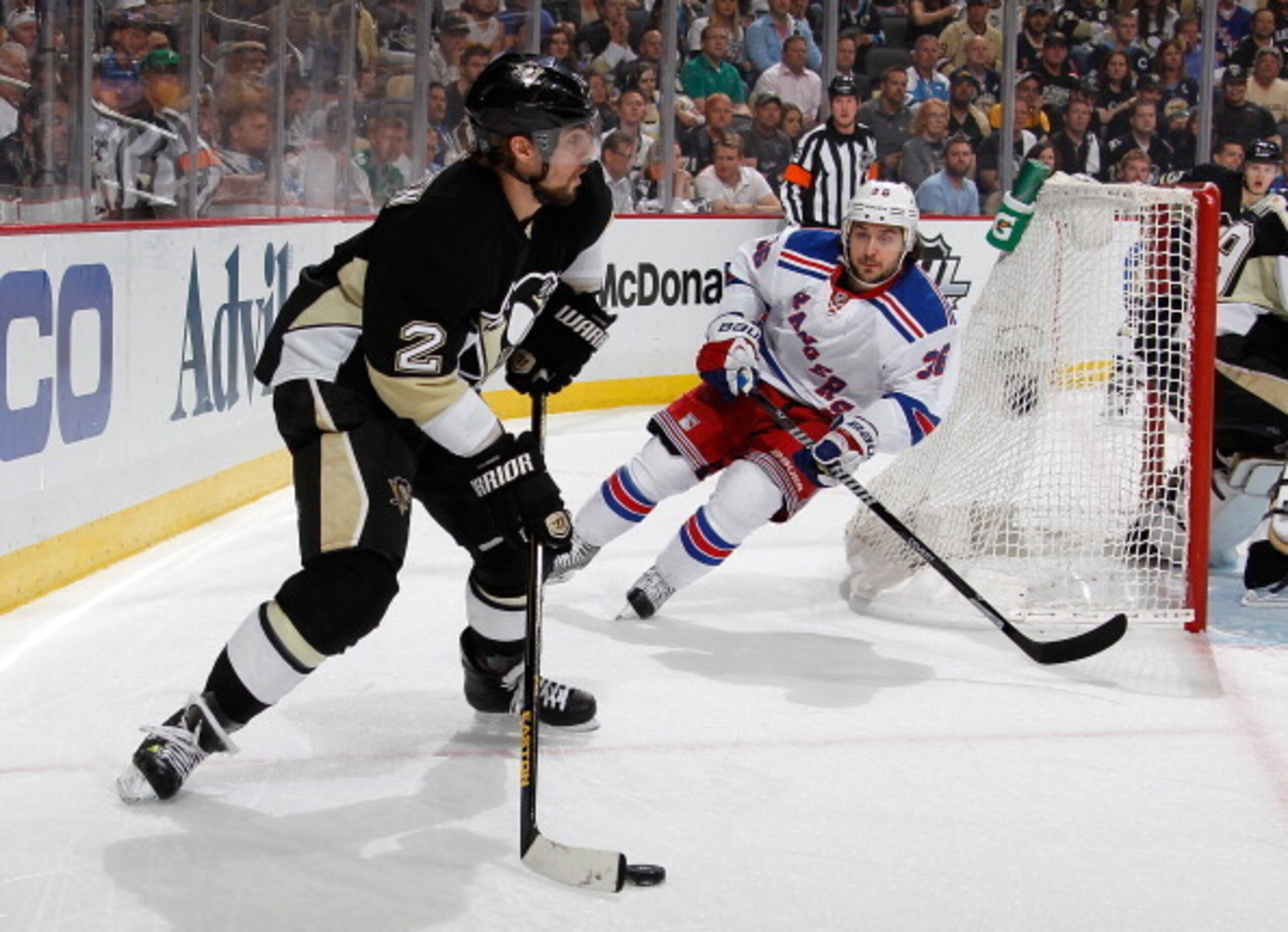Pittsburgh Penguins defenseman Matt Niskanen and New York Rangers forward Mats Zuccarello.