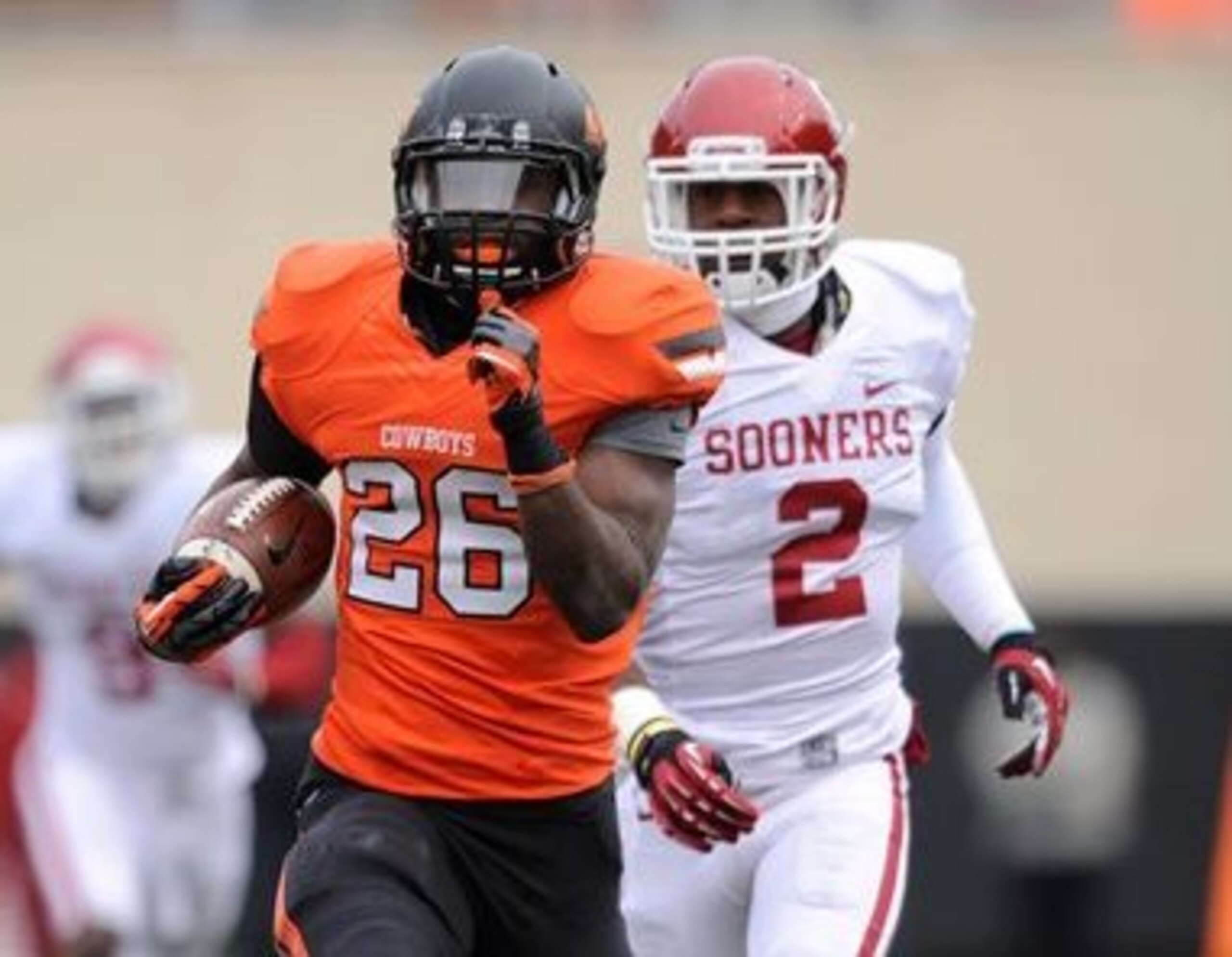 Desmond Roland had 13 rushing touchdowns for Oklahoma State in 2013. Desmond Roland had 13 rushing touchdowns for Oklahoma State in 2013.