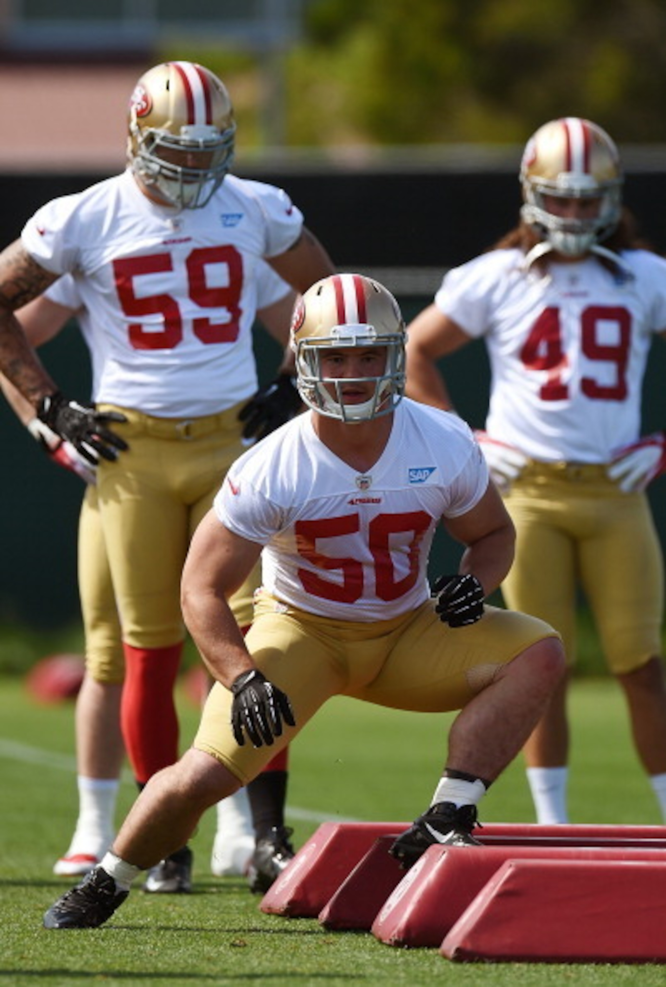 Chris Borland runs an agility drill in camp.