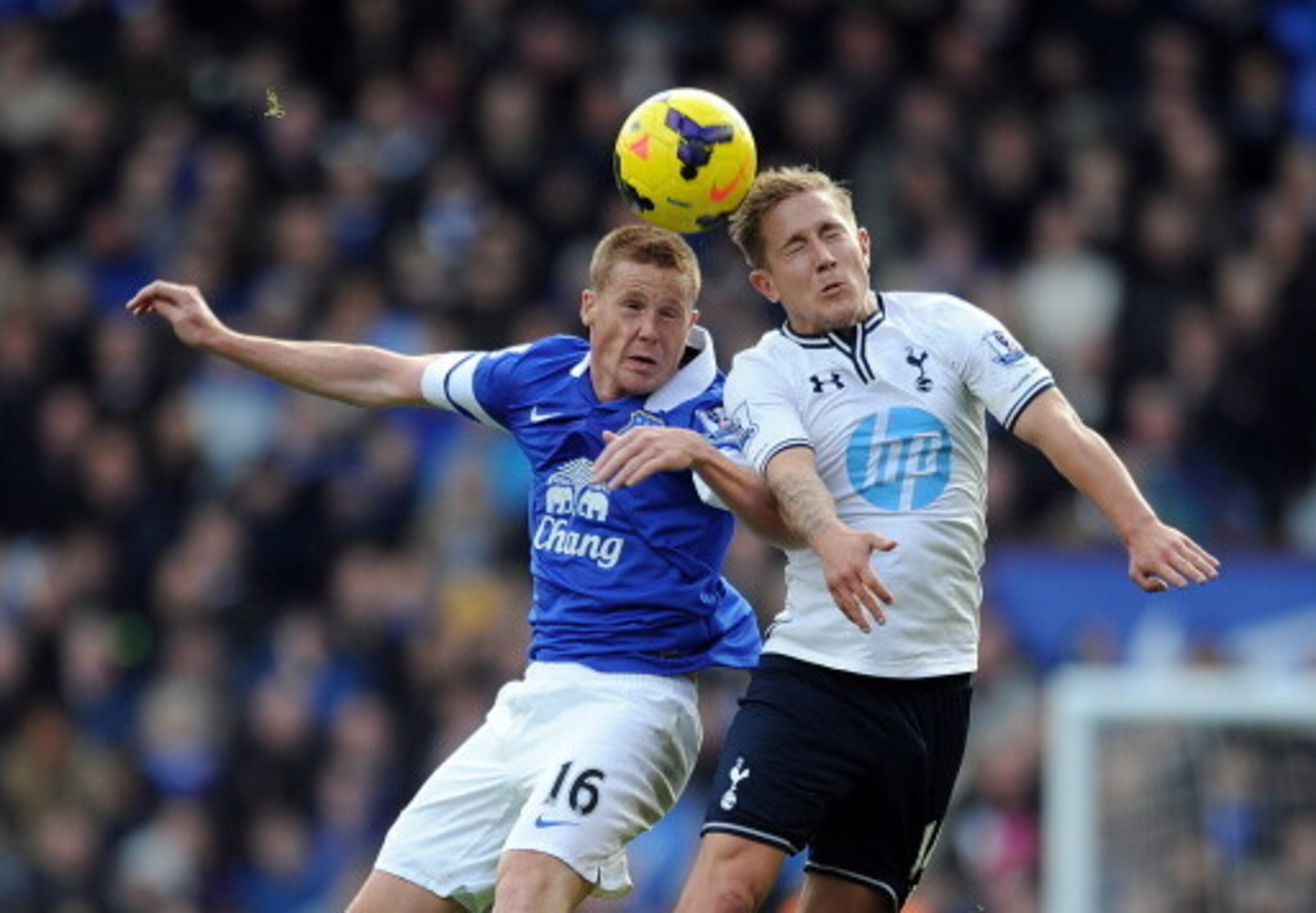 LIVERPOOL, ENGLAND - NOVEMBER 03: James McCarthy (L) of Everton jumps for a header with Lewis Holtby of Tottenham Hotpsur during the Barclays Premier League match between Everton and Tottenham Hotspur at Goodison Park on November 03, 2013 in Liverpool, En