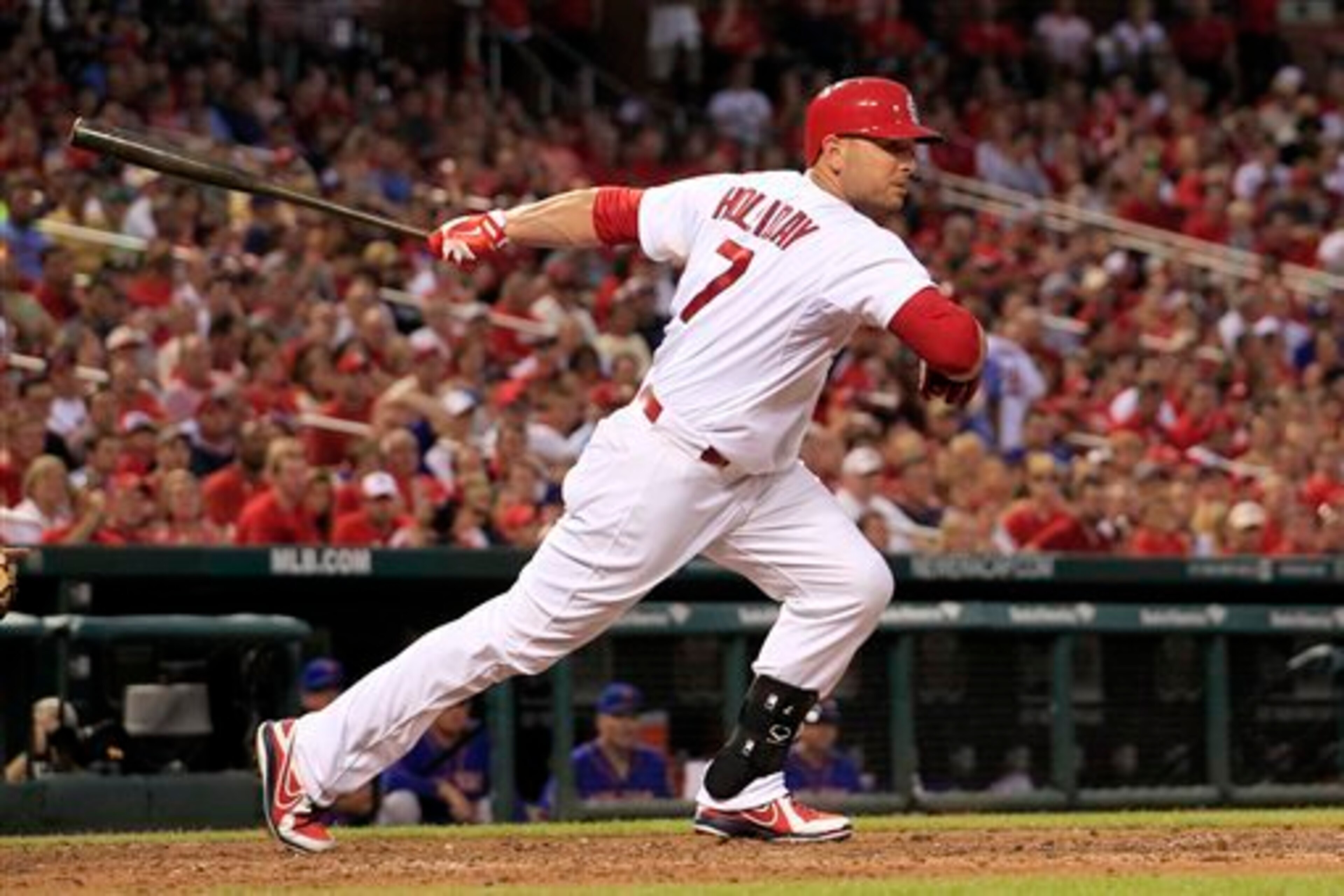 Cardinals' left fielder Matt Holliday gets a hit against the Mets June 17.