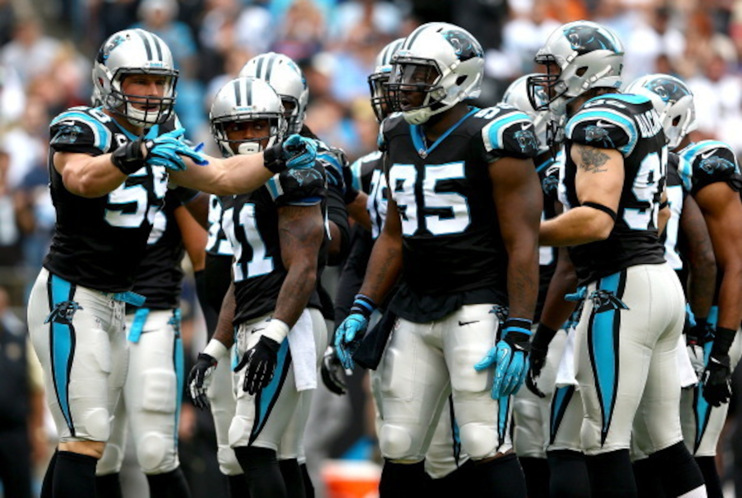 Carolina's defense huddling