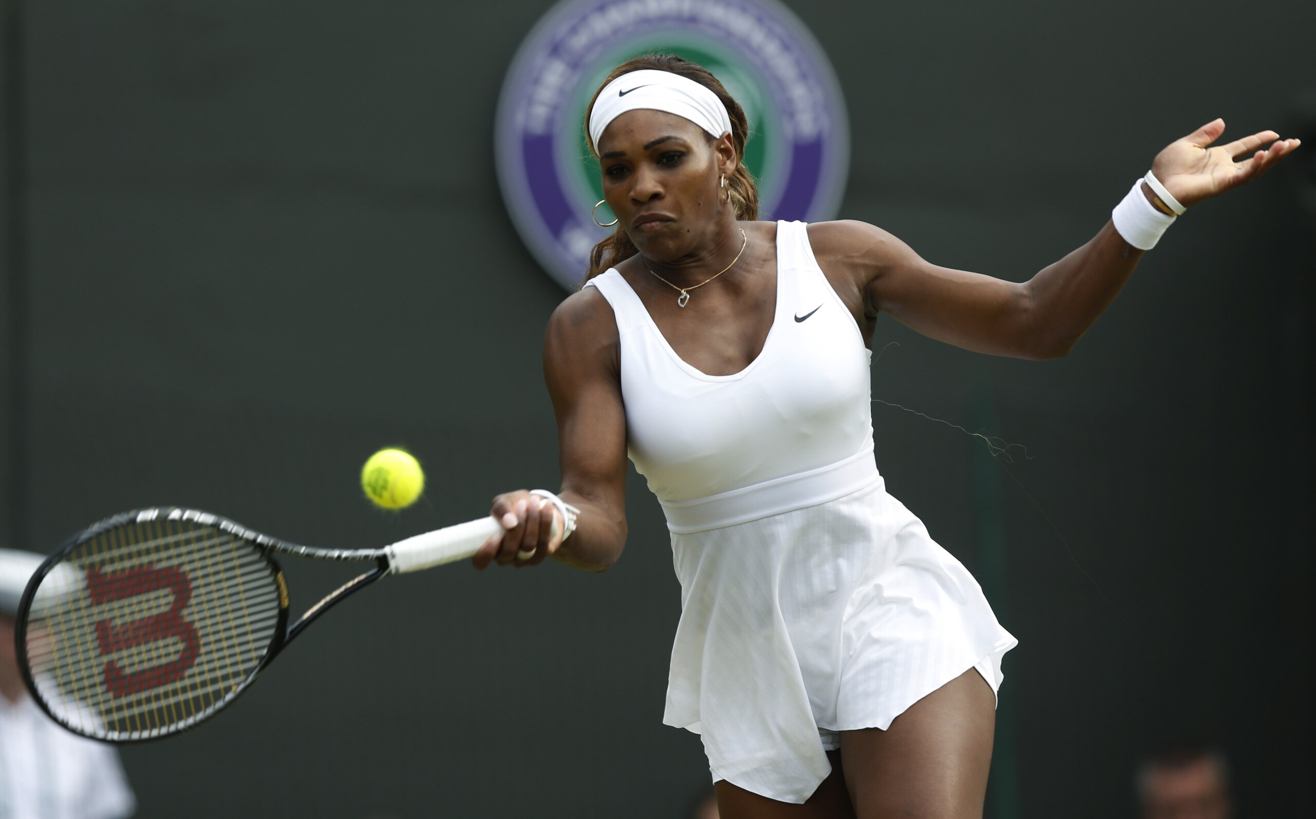 Serena Williams hit a forehand during her third-round match at Wimbledon.