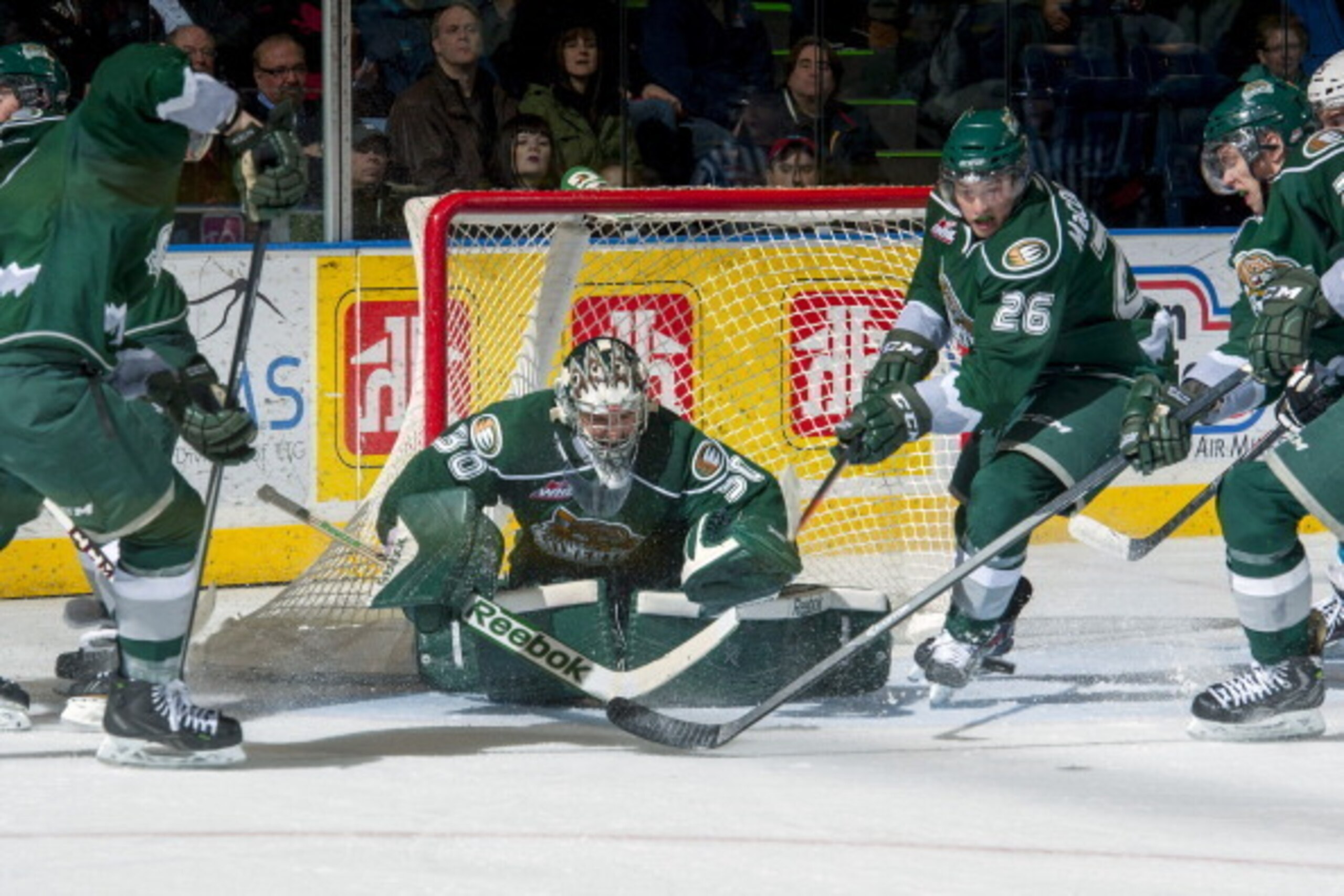 Lotz makes a save for Everett during the 2013-14 WHL season.