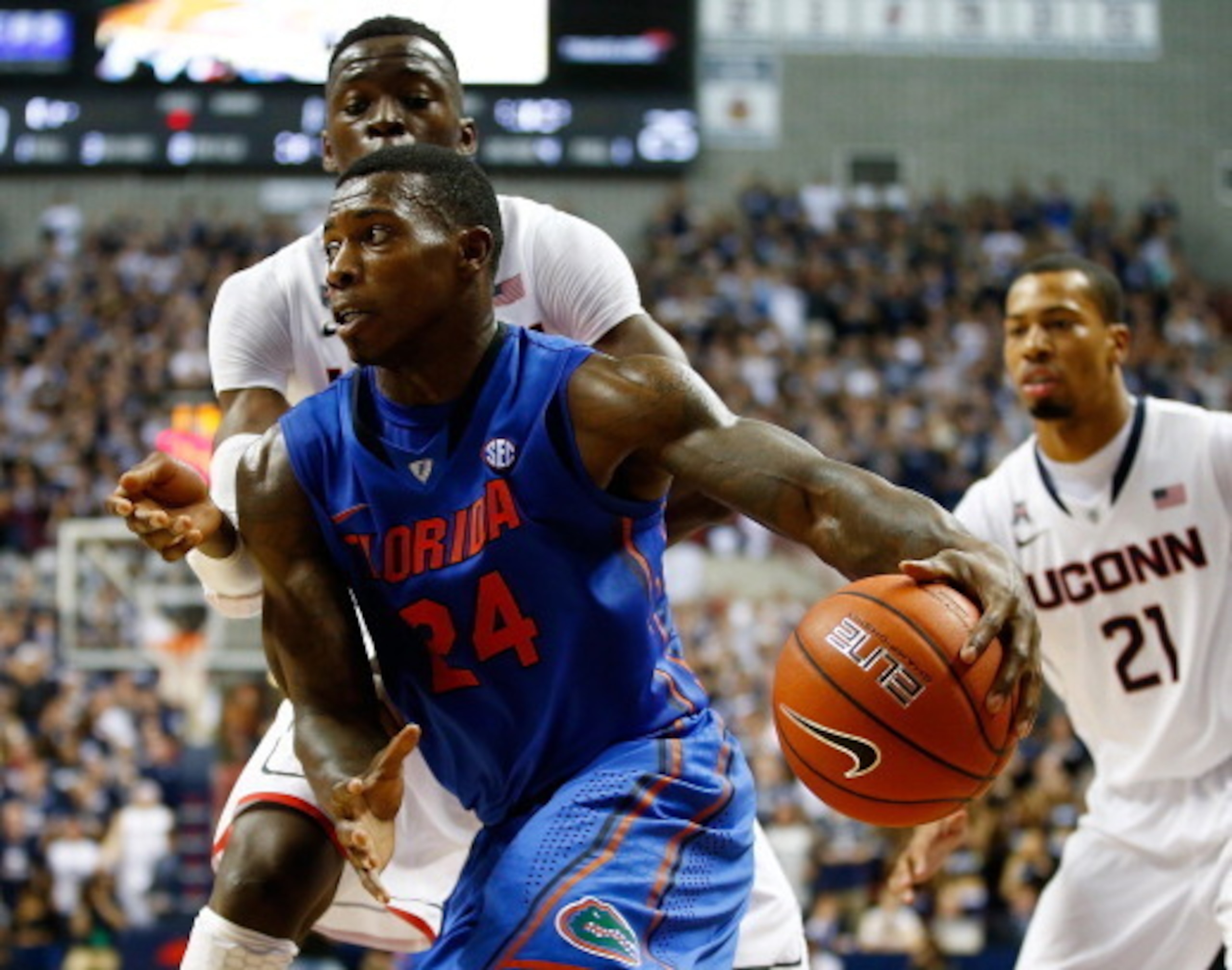 STORRS, CT - DECEMBER 02: Casey Prather #24 of the Florida Gators drives to the basket against the Connecticut Huskies during the game at Harry A. Gampel Pavilion on December 2, 2013 in Storrs, Connecticut.  (Photo by Jared Wickerham/Getty Images)