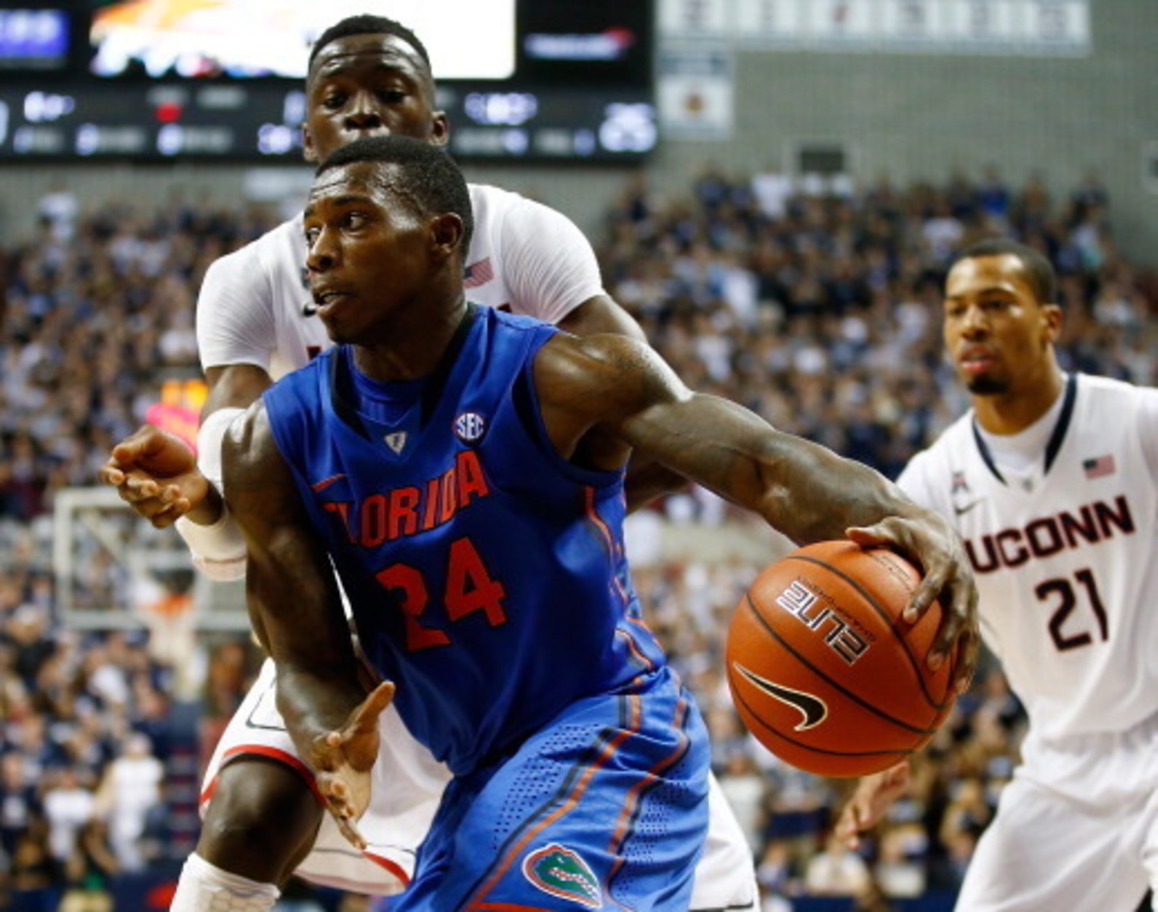 STORRS, CT - DECEMBER 02: Casey Prather #24 of the Florida Gators drives to the basket against the Connecticut Huskies during the game at Harry A. Gampel Pavilion on December 2, 2013 in Storrs, Connecticut.  (Photo by Jared Wickerham/Getty Images)