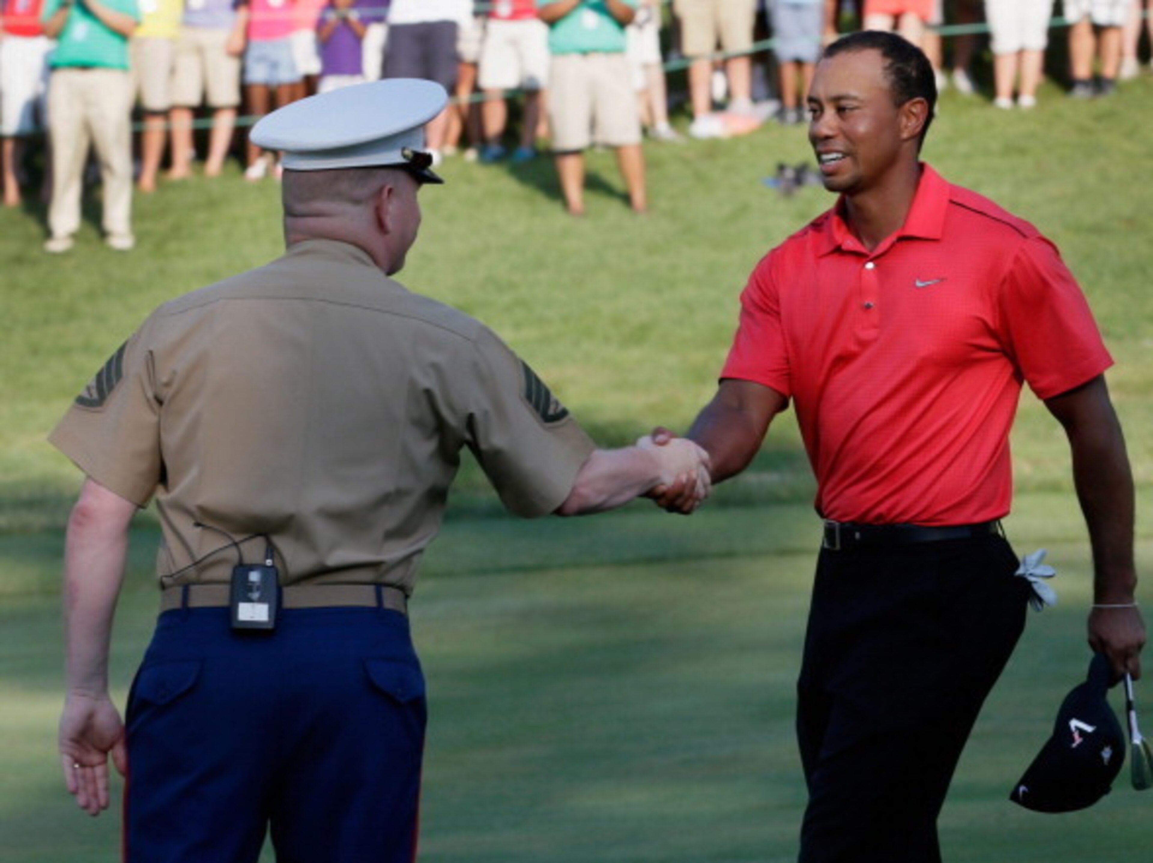 Tiger Woods greets a Marine at the National. Tiger Woods greets a Marine at the National.