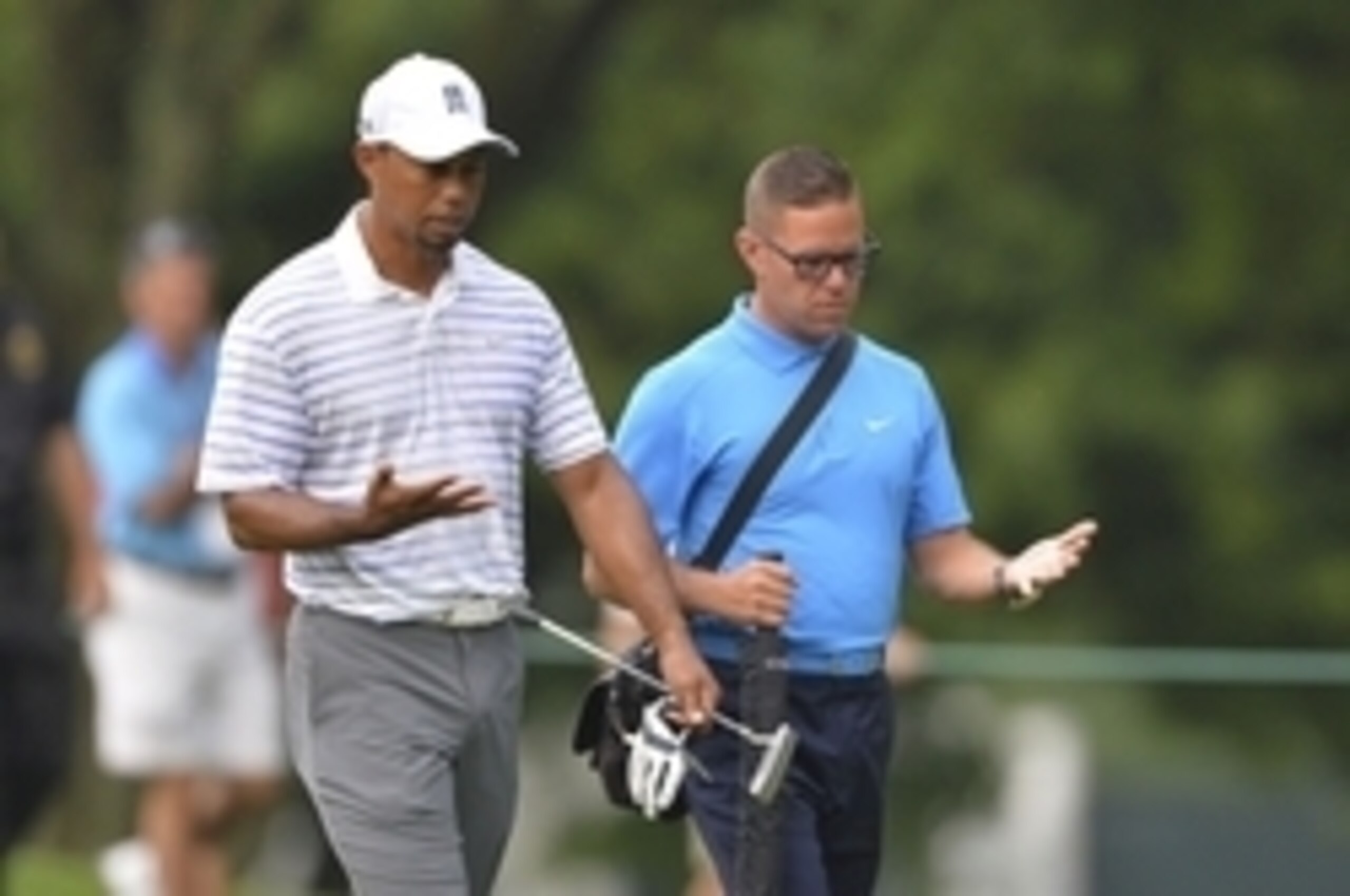Tiger Woods played a practice round at Congressional with swing coach Sean Foley.