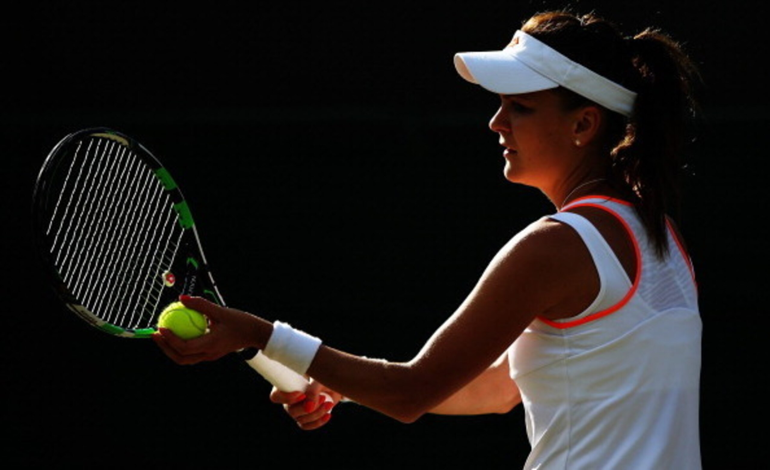 Agnieszka Radwanska prepares to serve during Wimbledon.