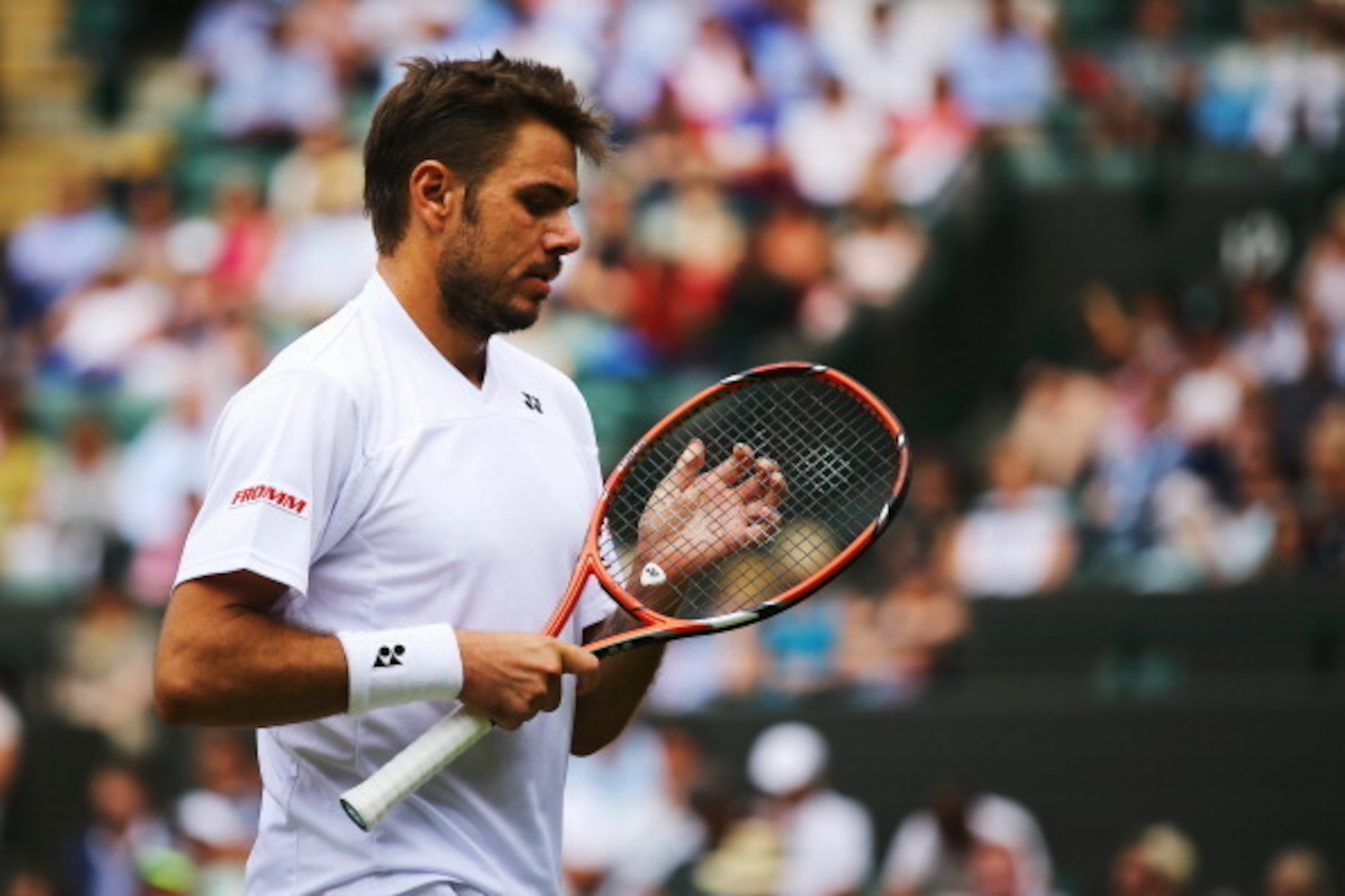 Stanislas Wawrinka concentrates during his second-round match at Wimbledon.